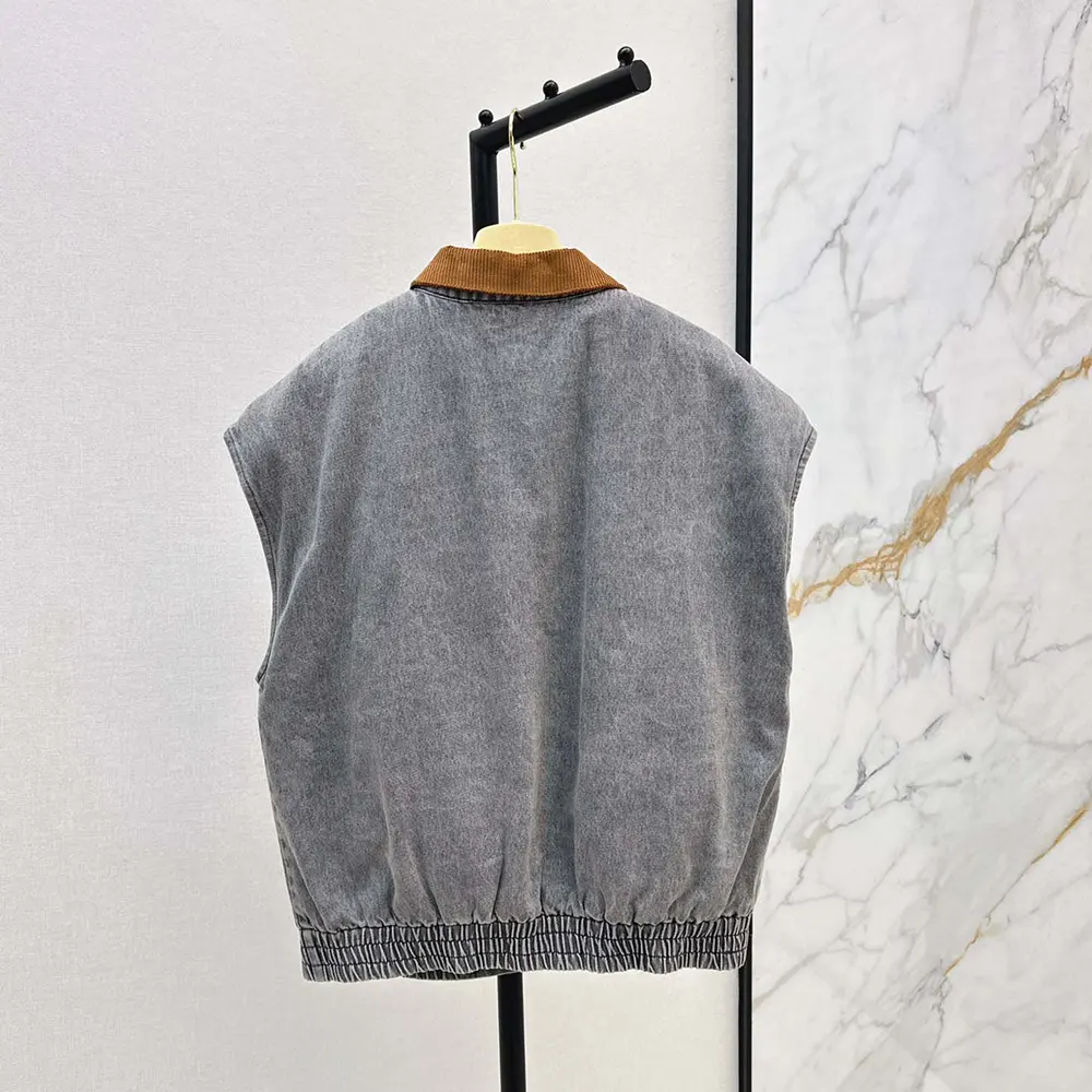 Side profile highlighting silhouette of Miu Miu Women Chambray Blouson Vest