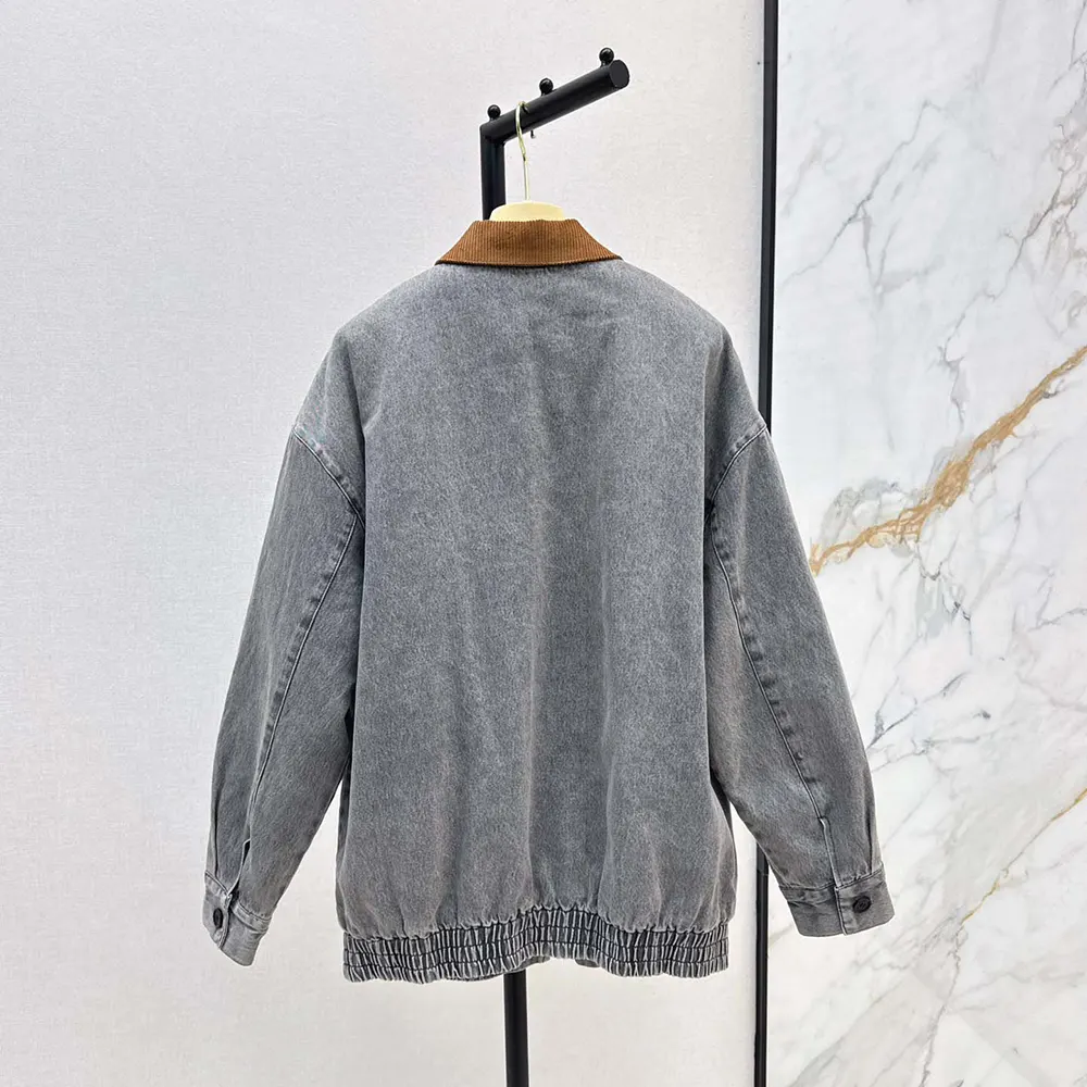 Side profile showing tailored fit of Miu Miu Women Chambray Jacket