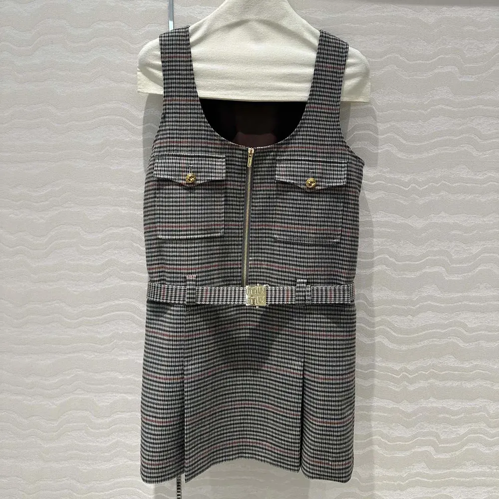 Close-up of signature buttons on Miu Miu Women Checked Dress sleeve