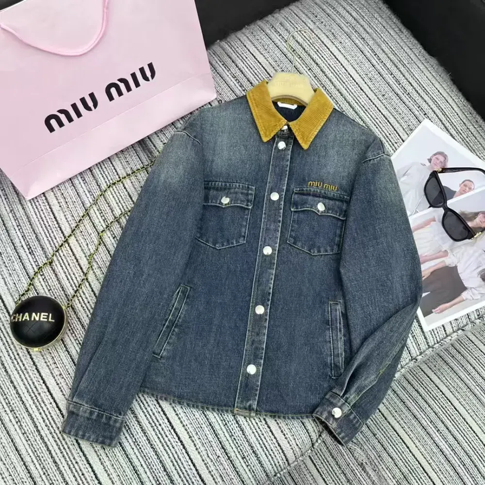 Close-up on signature quilting of Miu Miu Women Denim Blouson Jacket