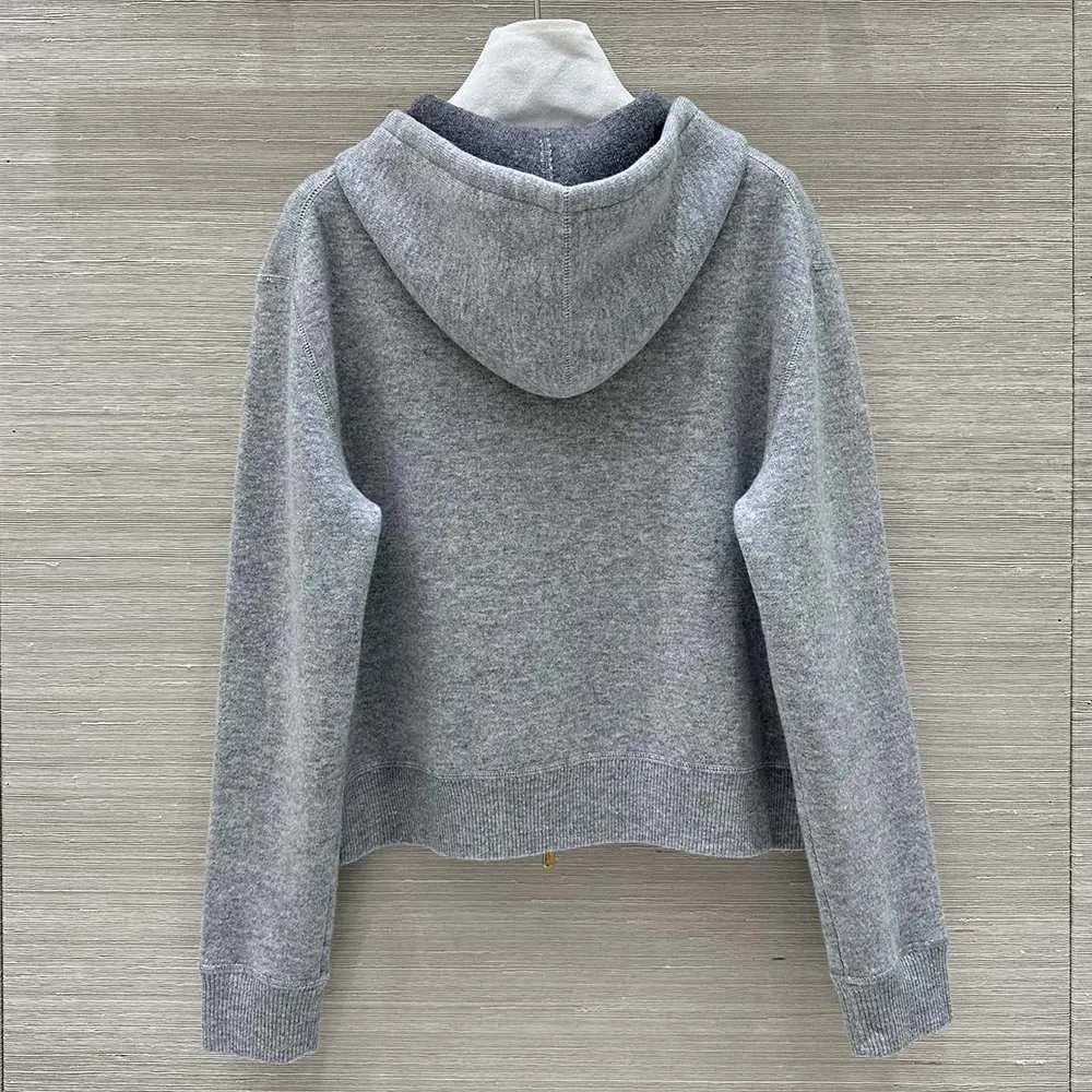 Side angle showing relaxed fit of Miu Miu Women Double Cashmere Hoodie Cardigan