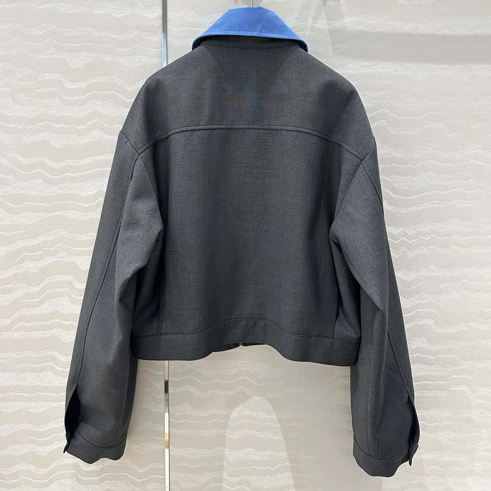 Side angle of grey Miu Miu Women Gabardine Blouson Jacket showcasing silhouette