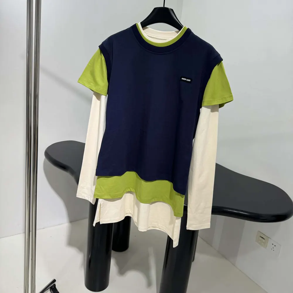 Stacked side view showing three navy Miu Miu Women Jersey T-shirts