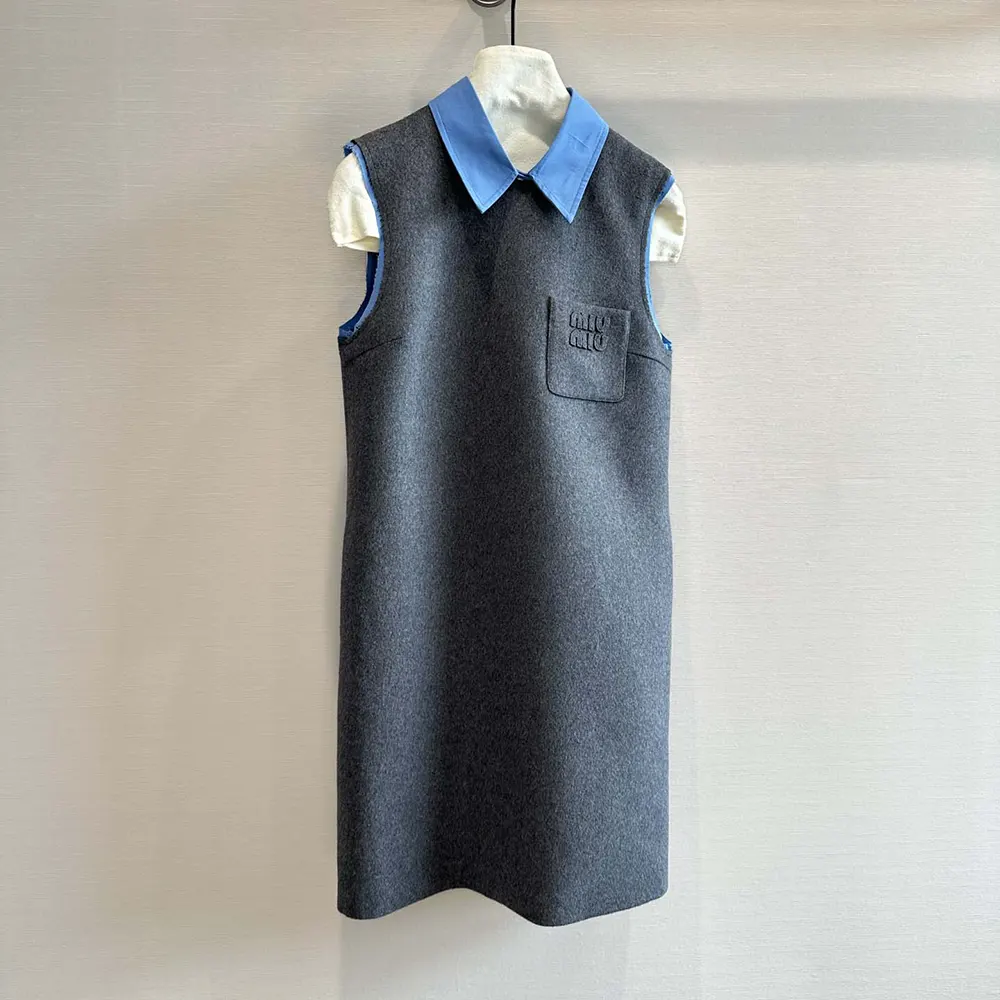 Close-up on Miu Miu Women Velour Mini-dress signature logo hardware