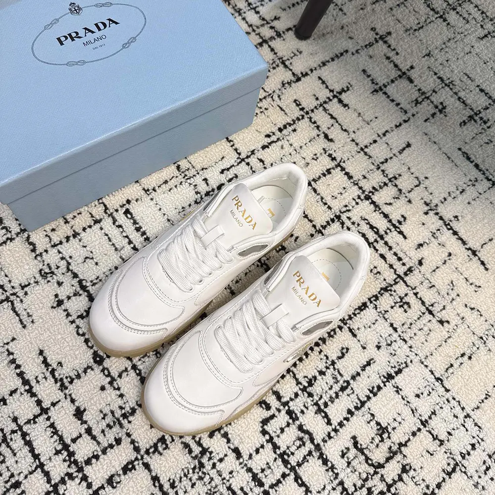 Top-down view showcasing lace-up detail on Prada Downtown Nappa Sneakers