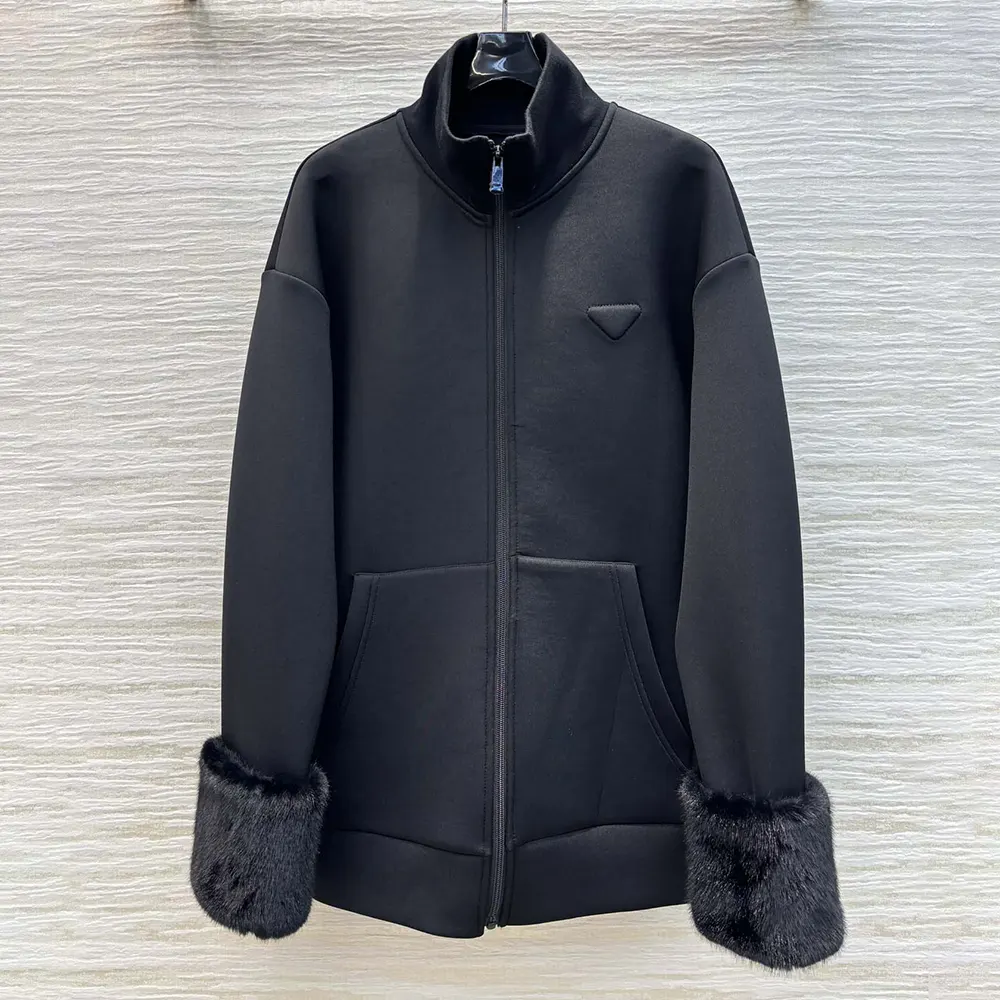 Close-up detail of high-neck and zipper on Prada fleece blouson
