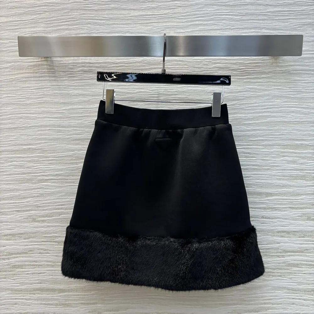 Side angle of Prada Women Sweatskirt-Black highlighting drawstring waist