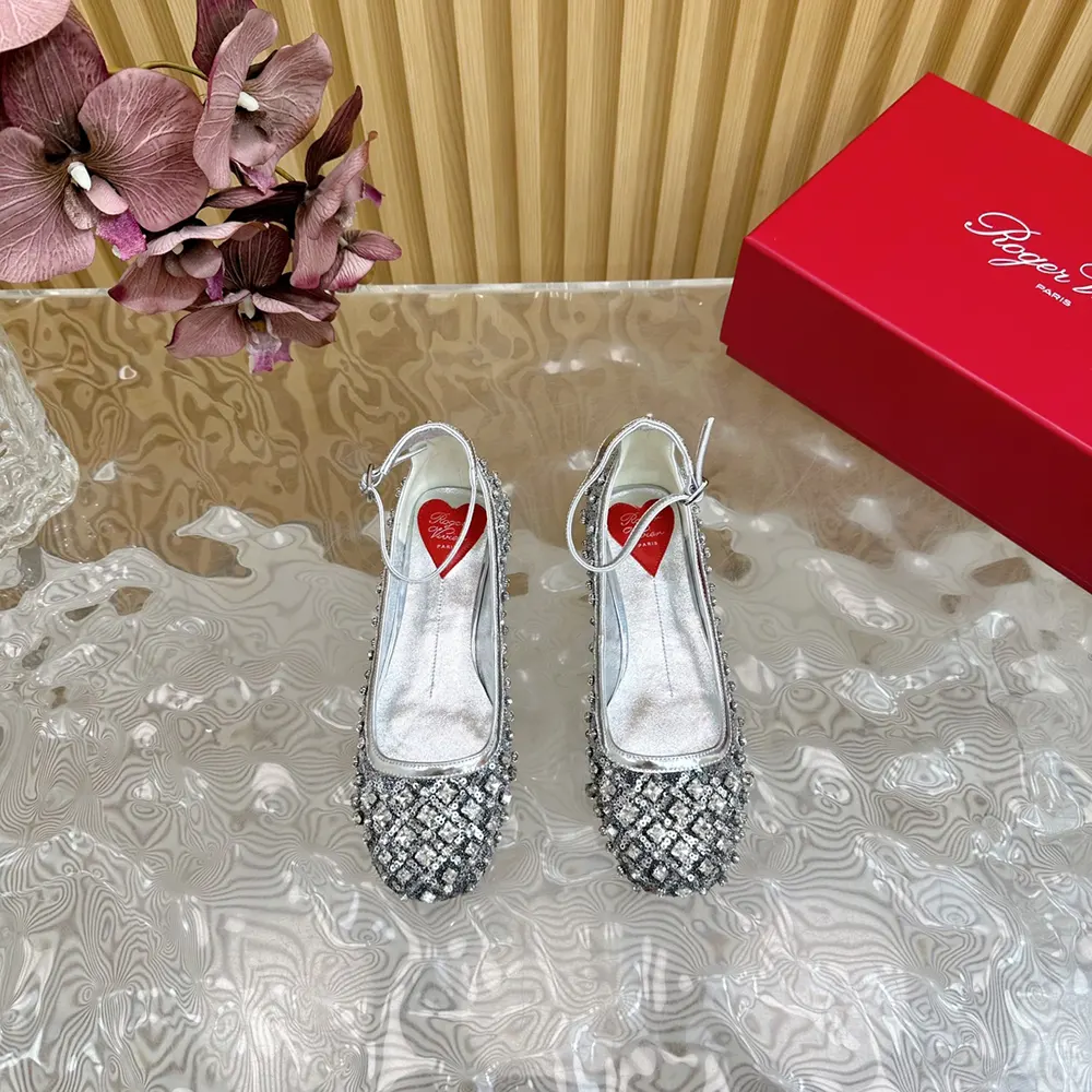 Close-up of Roger Vivier Women Viv’ Podium Ballerinas signature buckle detail