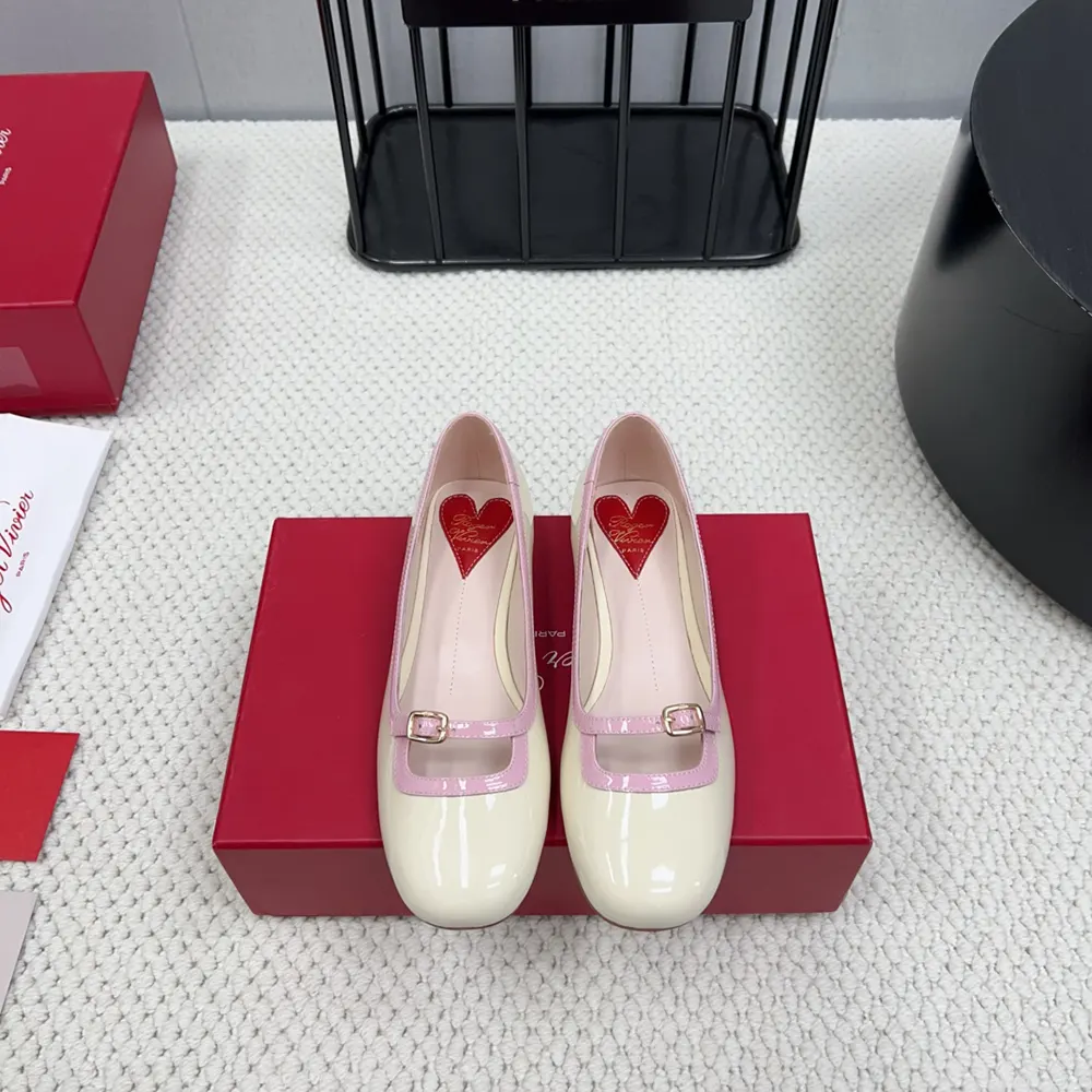 Close-up of signature metal buckle on Roger Vivier Viv’ Podium Ballerinas
