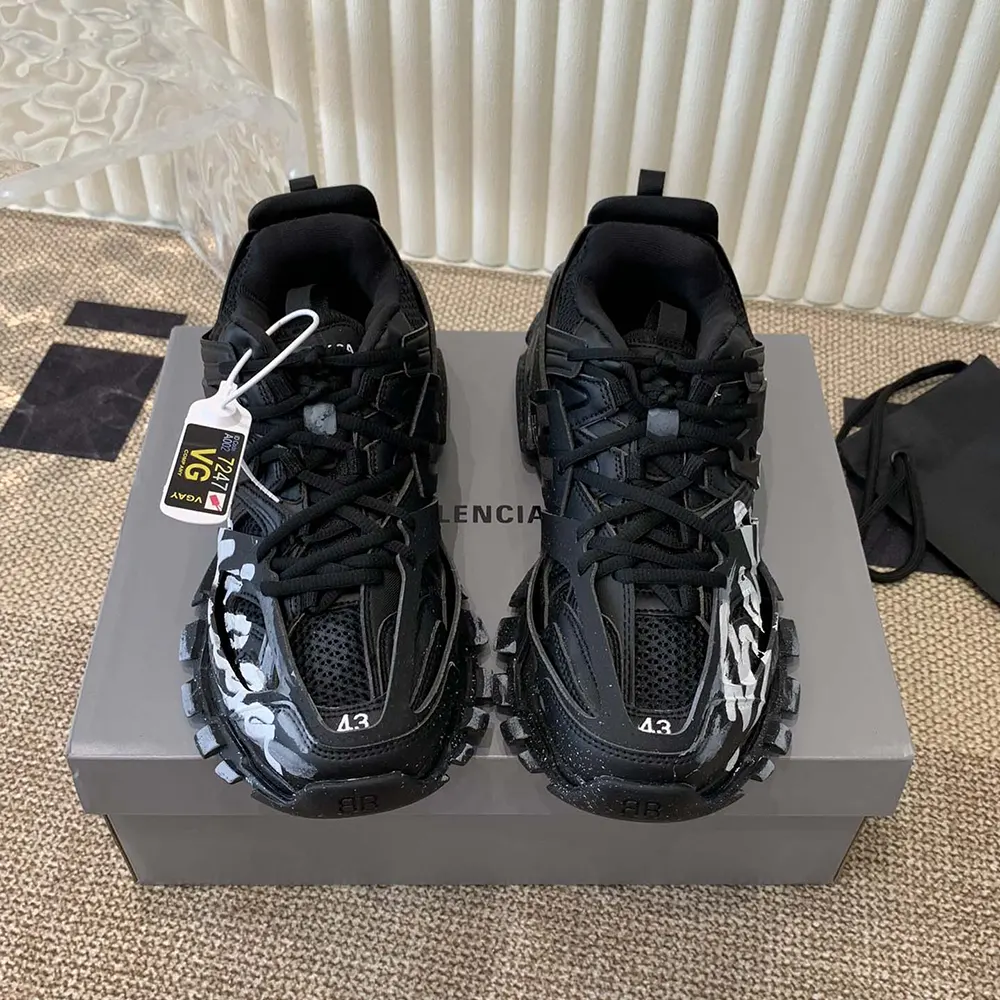 Close-up of Balenciaga logo detail on the Track Signature Sneaker