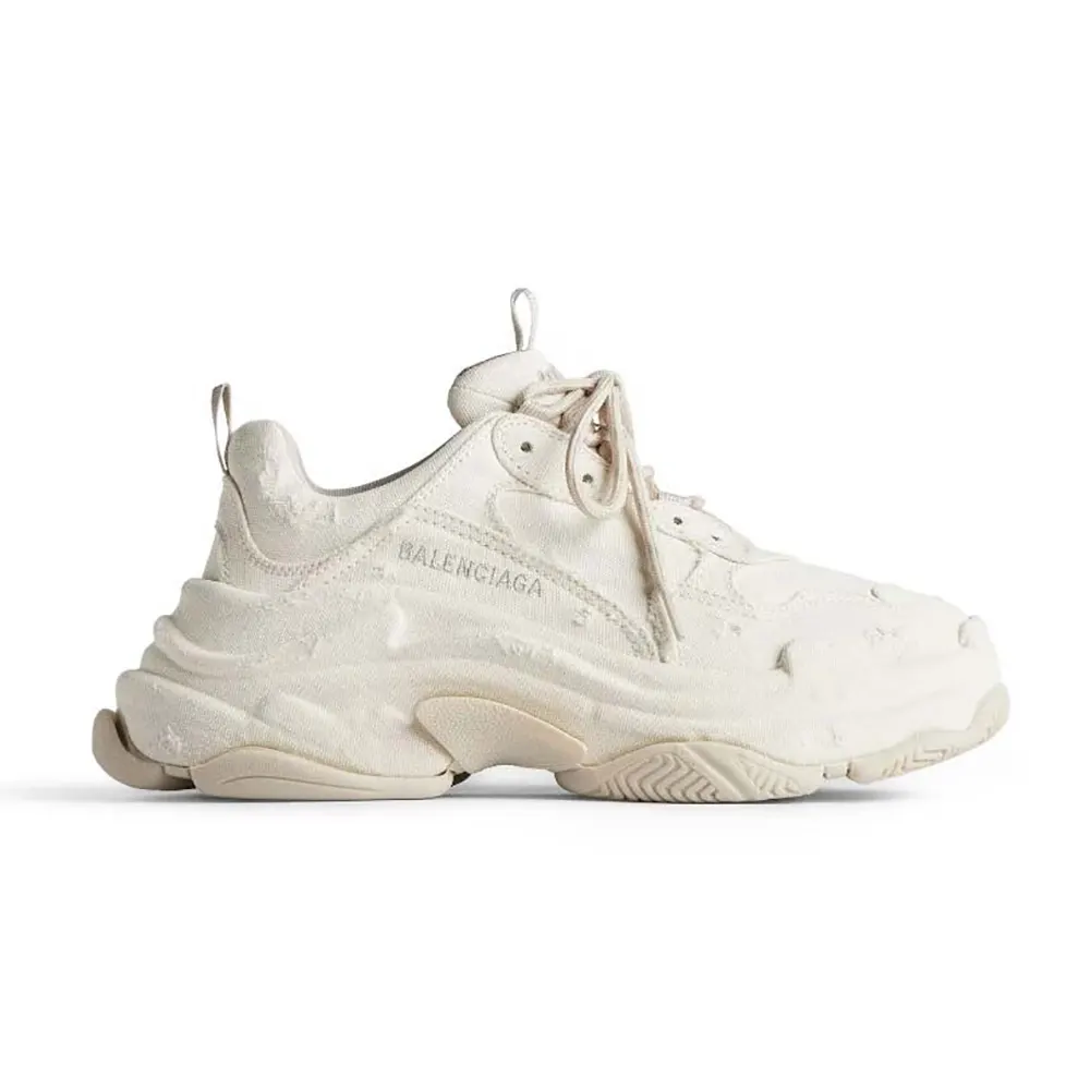 Side profile of Balenciaga Unisex Triple S Sneaker in Beige