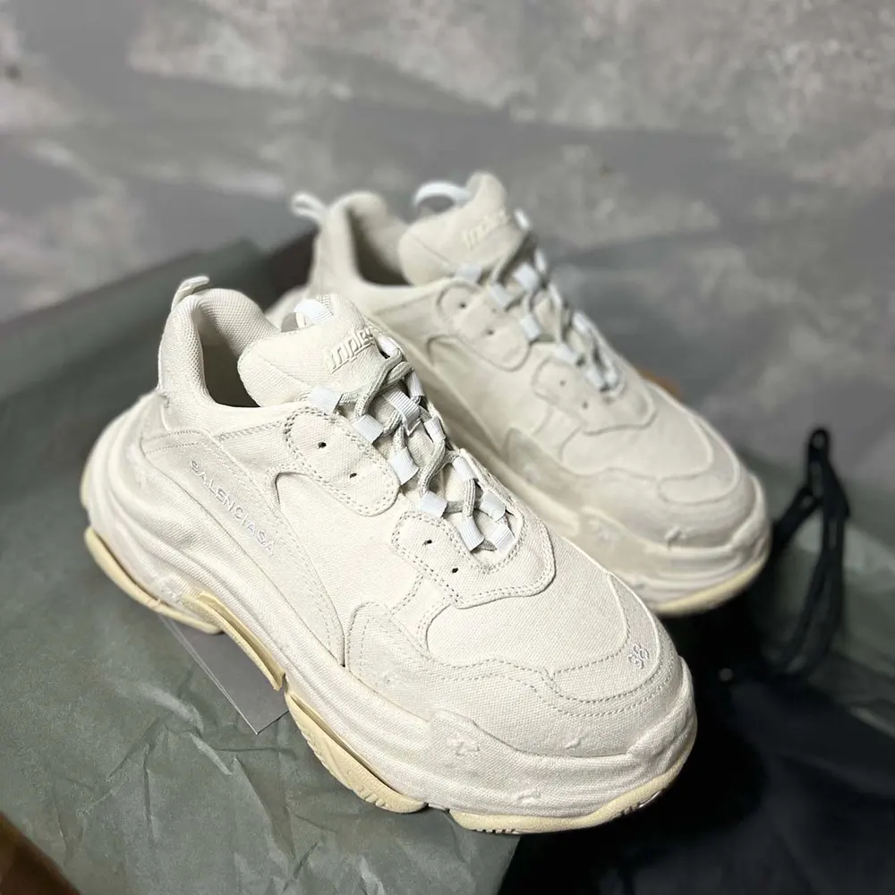 Close-up on layered sole and leather details, Balenciaga Triple S sneaker