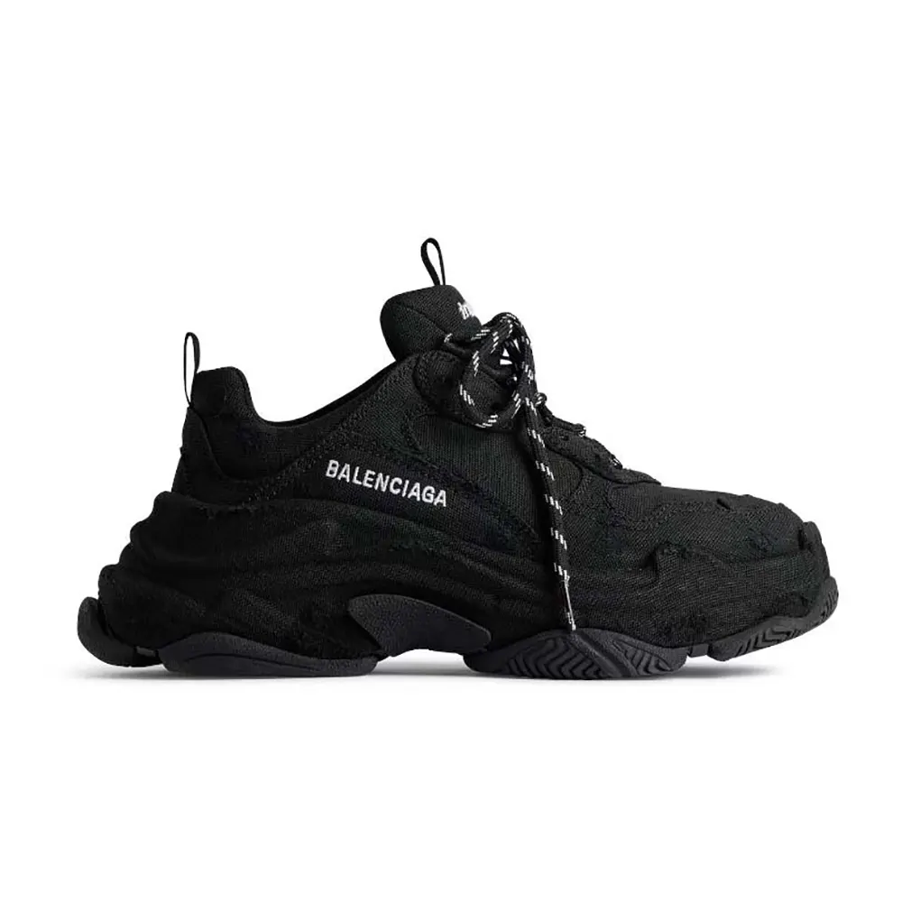 Side profile of Balenciaga Unisex Triple S Sneaker in Black showing layered sole