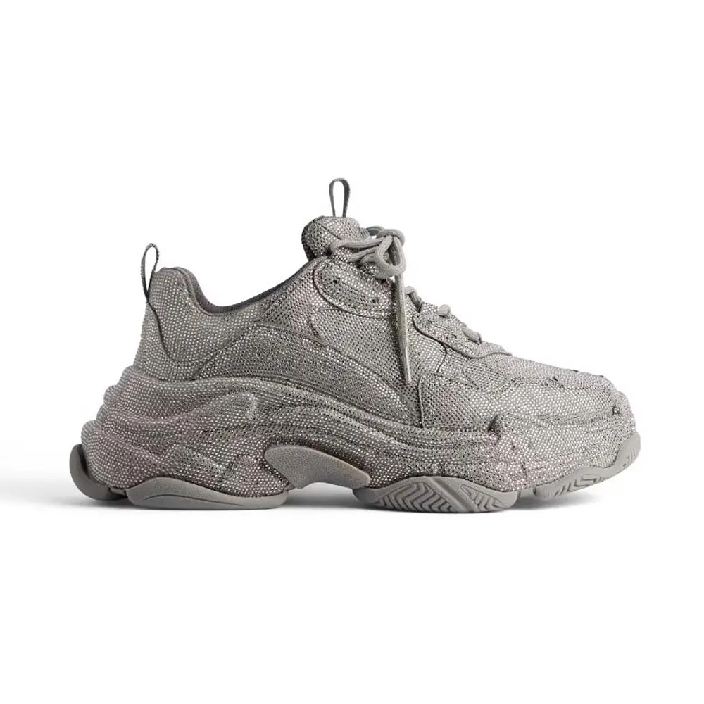 Side view of Balenciaga Unisex Triple S Sneaker with rhinestones in dark grey