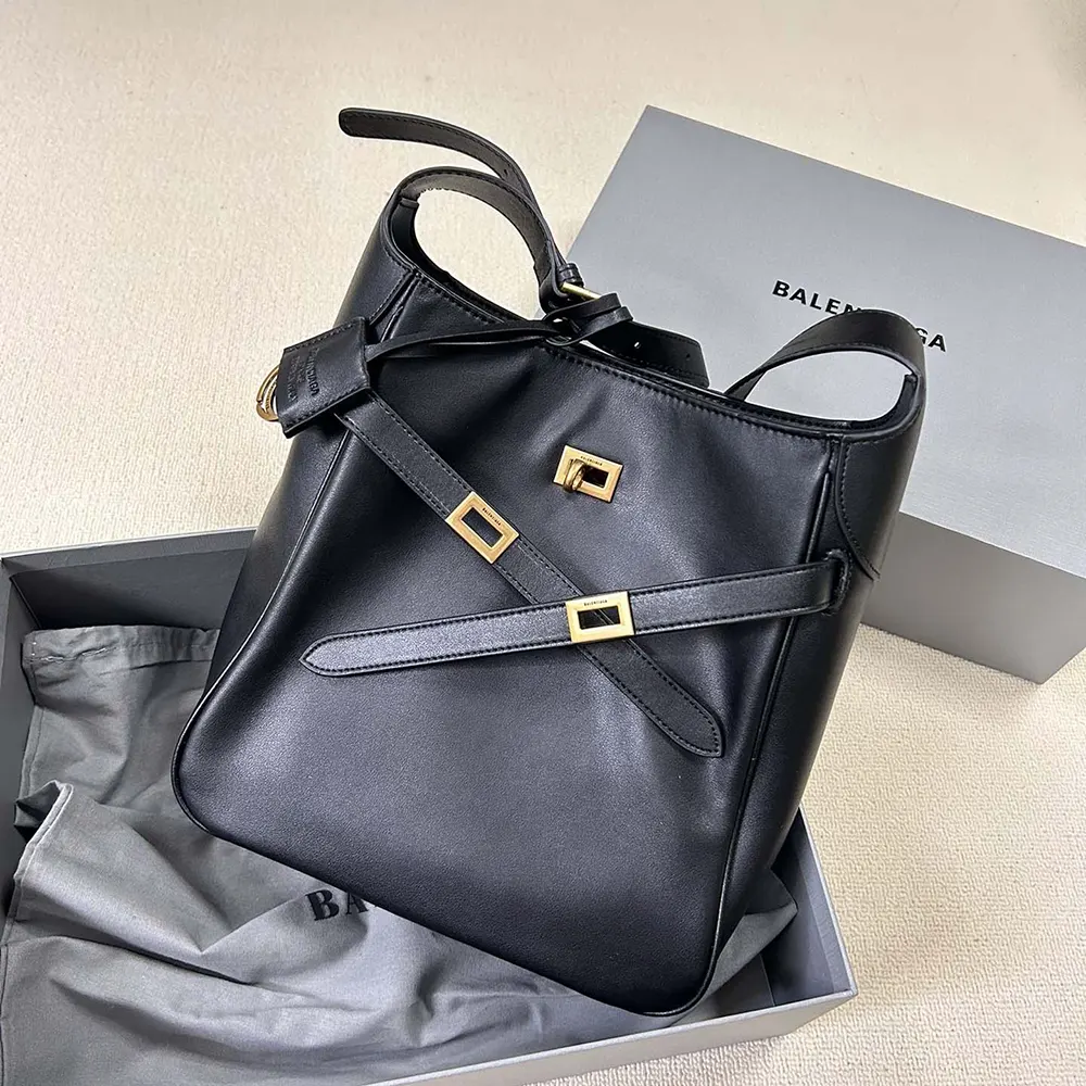 Side angle showing curved silhouette of Balenciaga Women Bel Air Hobo
