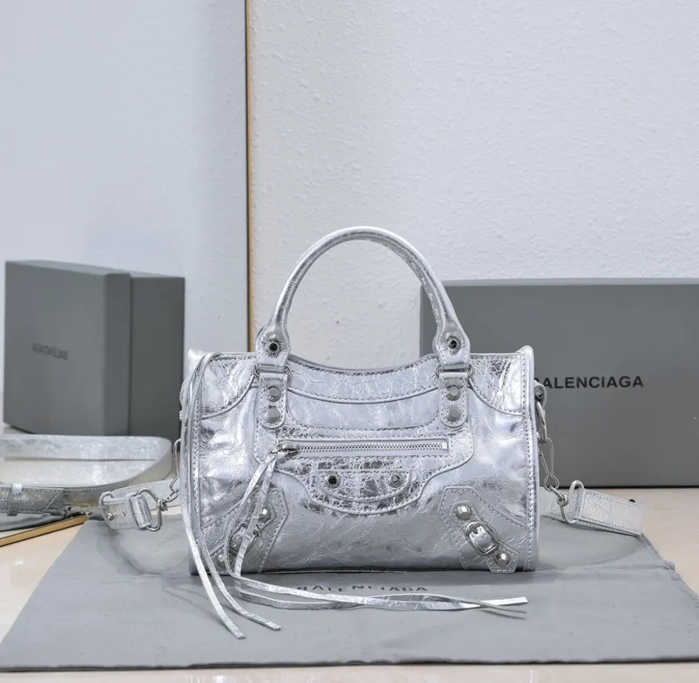 Side angle showcasing compact silhouette of Balenciaga Women Le City Small Bag