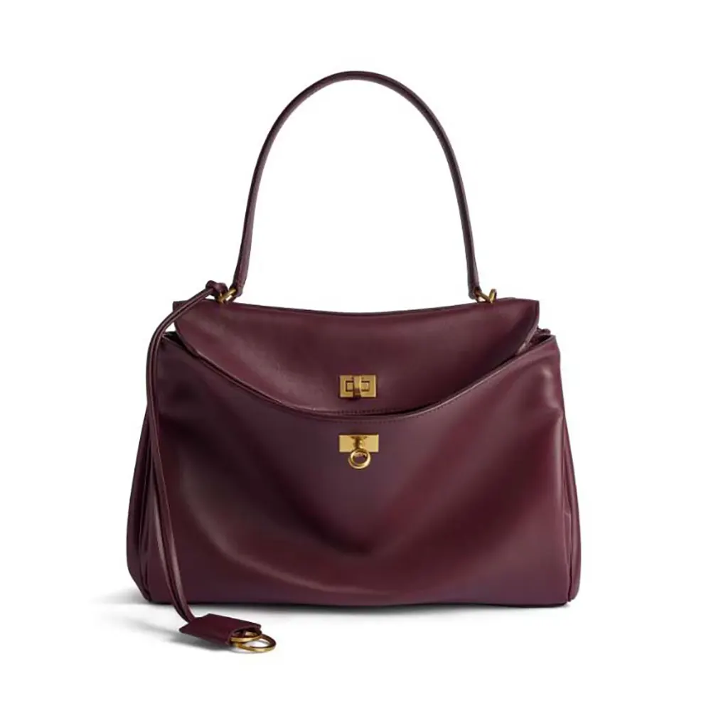 Front angle of Balenciaga Women Rodeo Medium Handbag dark burgundy leather