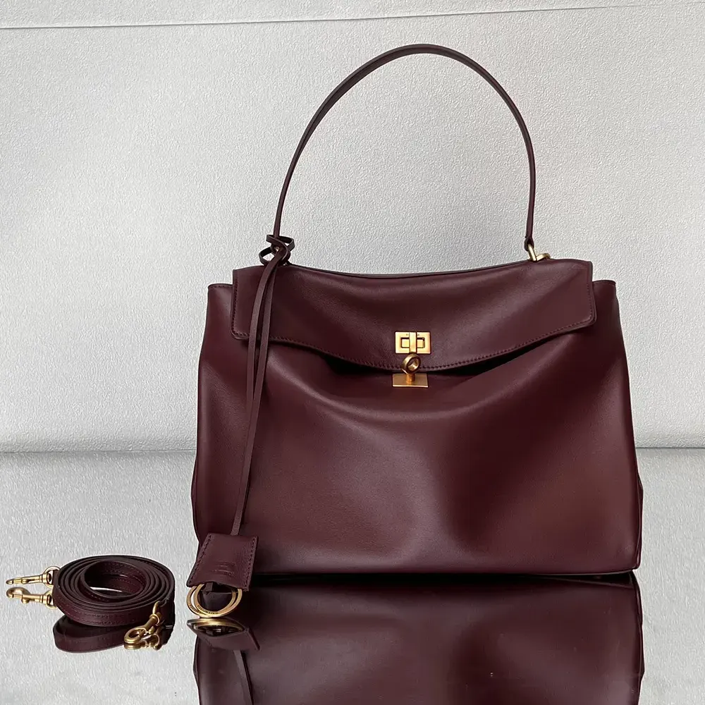 Close-up of antique gold hardware on Balenciaga Women Rodeo Medium Handbag