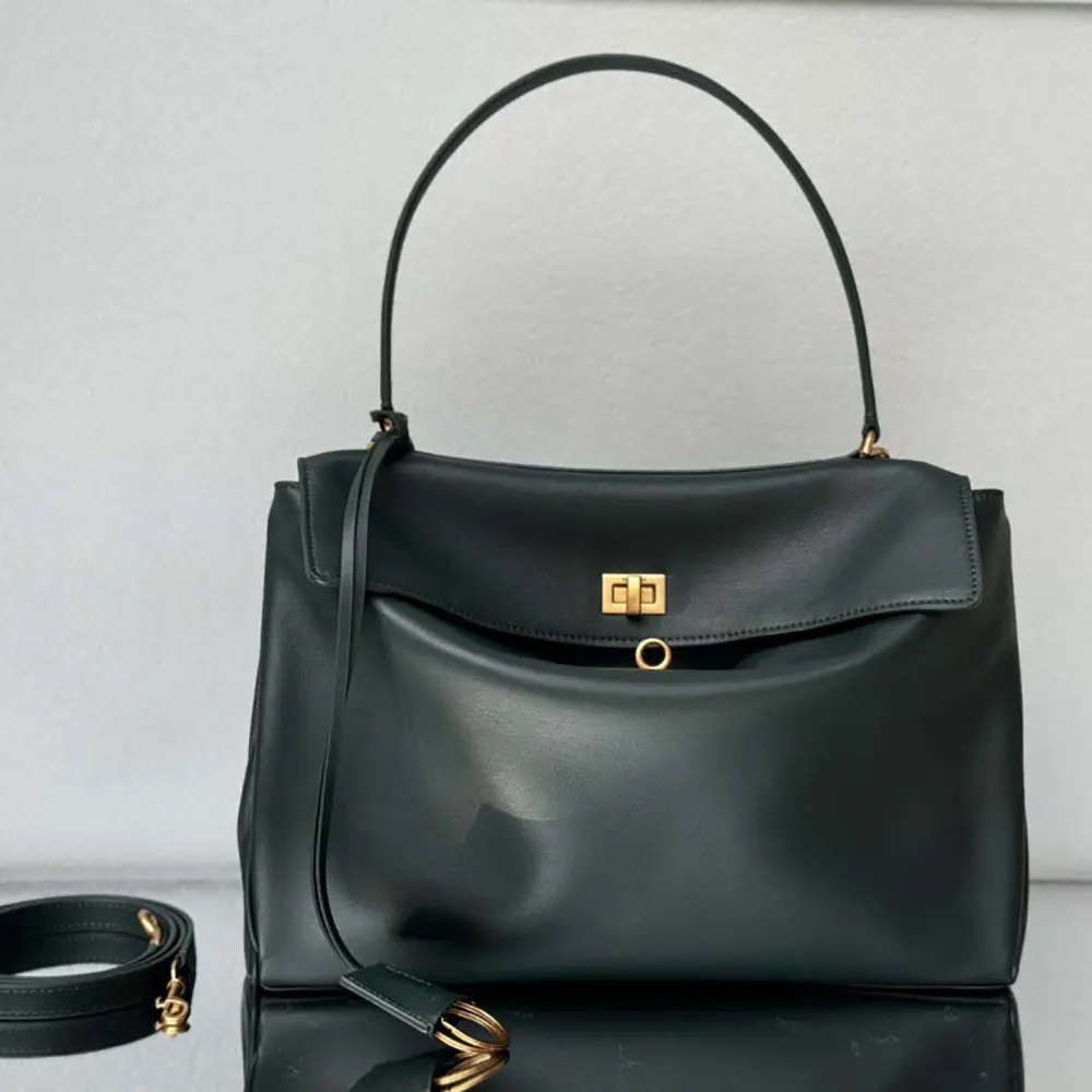 Close-up on silver oversized studs of Balenciaga Women Rodeo Medium Handbag