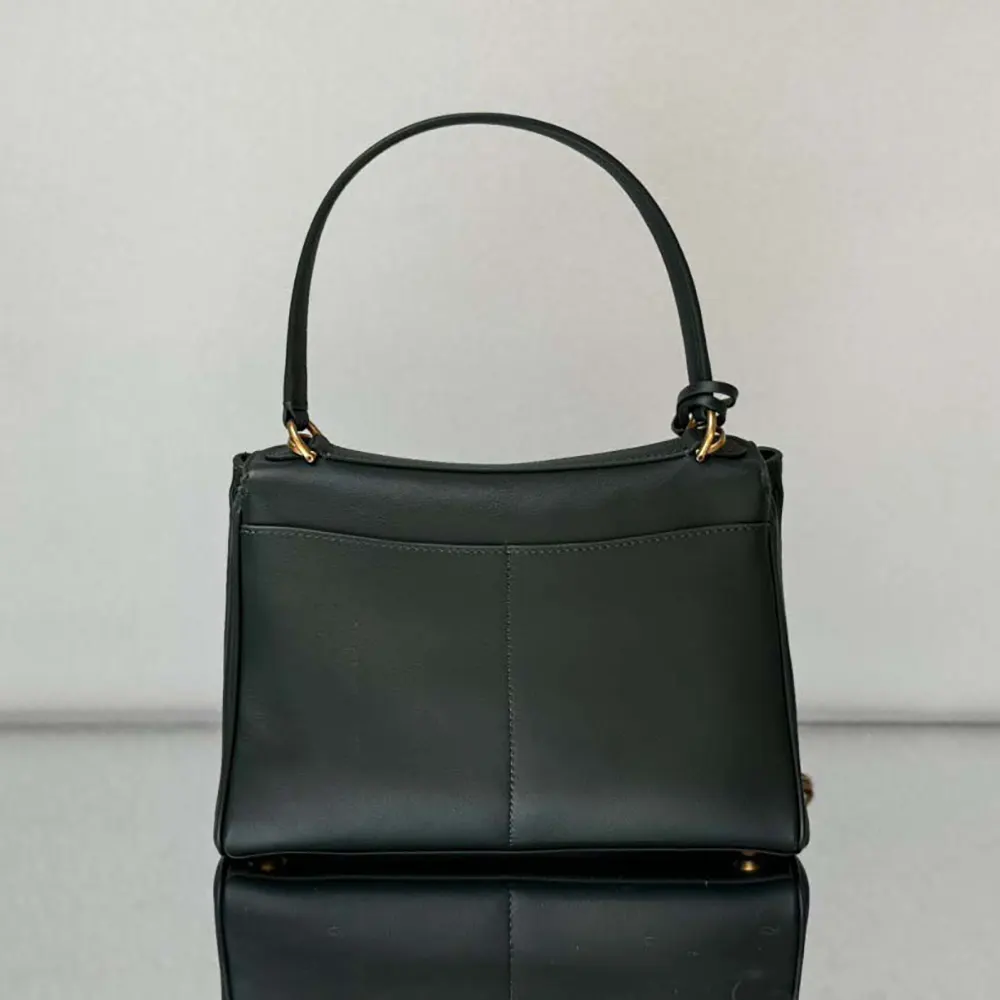 Side profile showing compact silhouette of Balenciaga Rodeo Mini Handbag