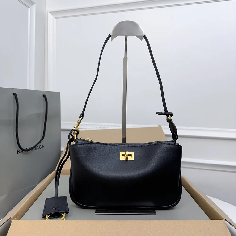 Close-up detail of silver-tone hardware on Balenciaga Women Rodeo Sling Pochette