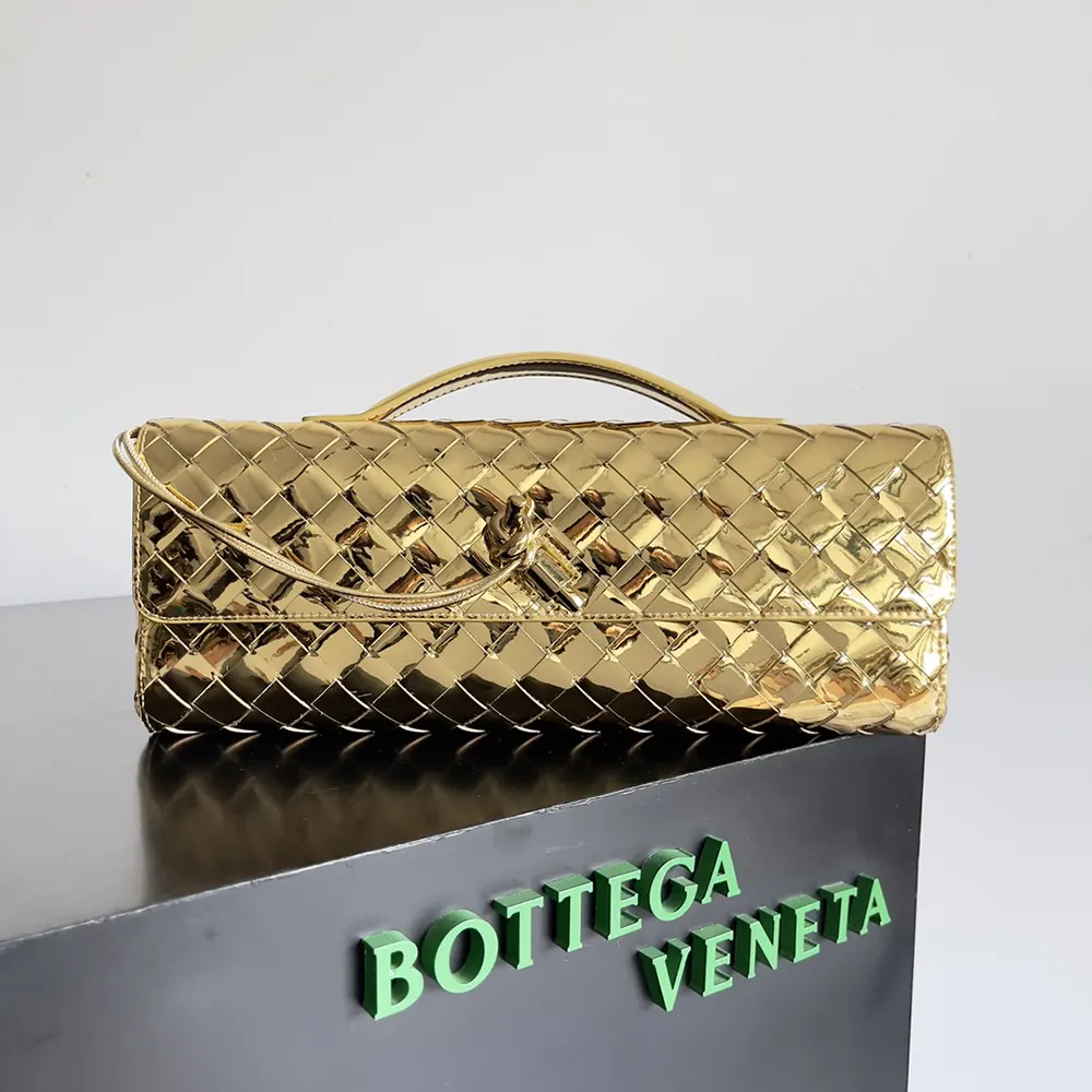 Close-up of gold-tone hardware on Bottega Veneta Women Andiamo Clutch