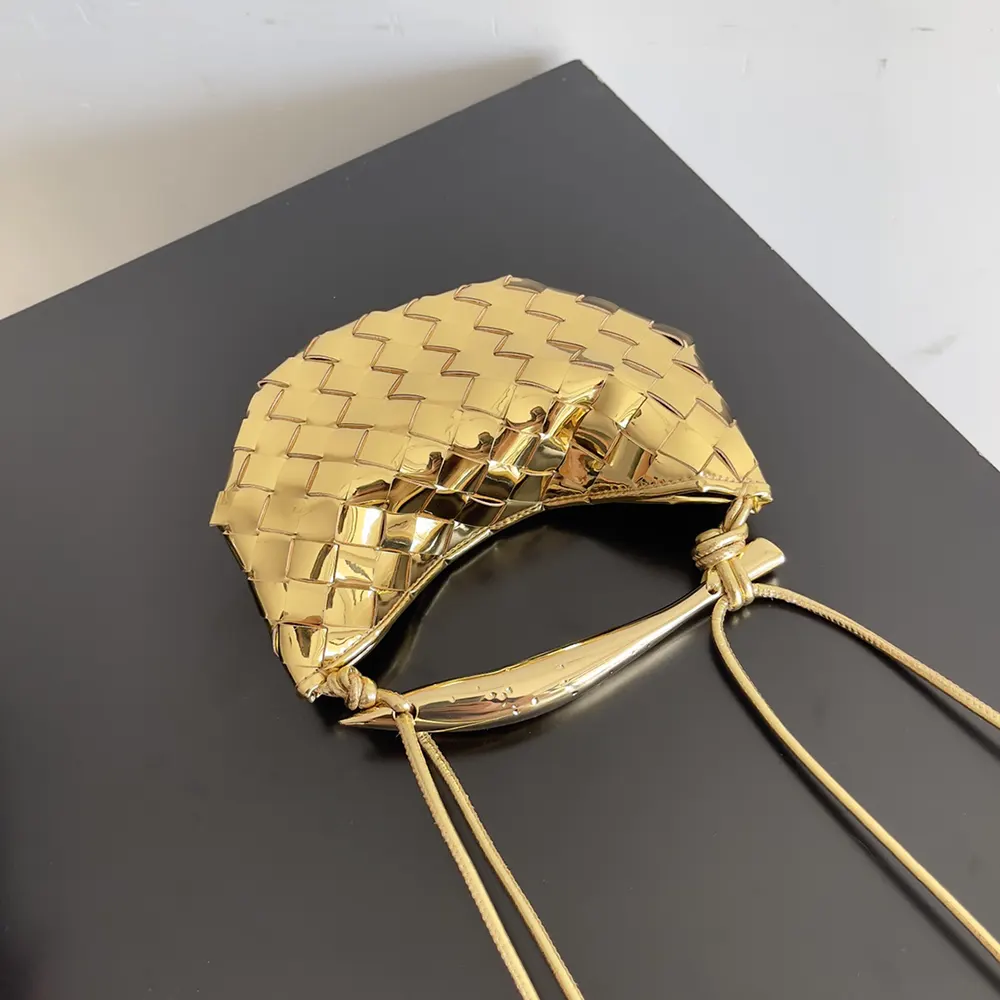 Side view showcasing gold-tone hardware on Baby Sardine-Gold bag