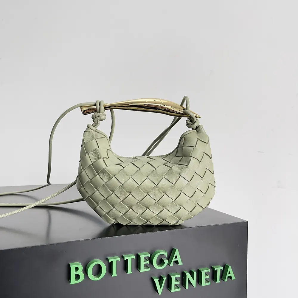 Close-up of intrecciato leather texture on Bottega Veneta Women Baby Sardine-Green