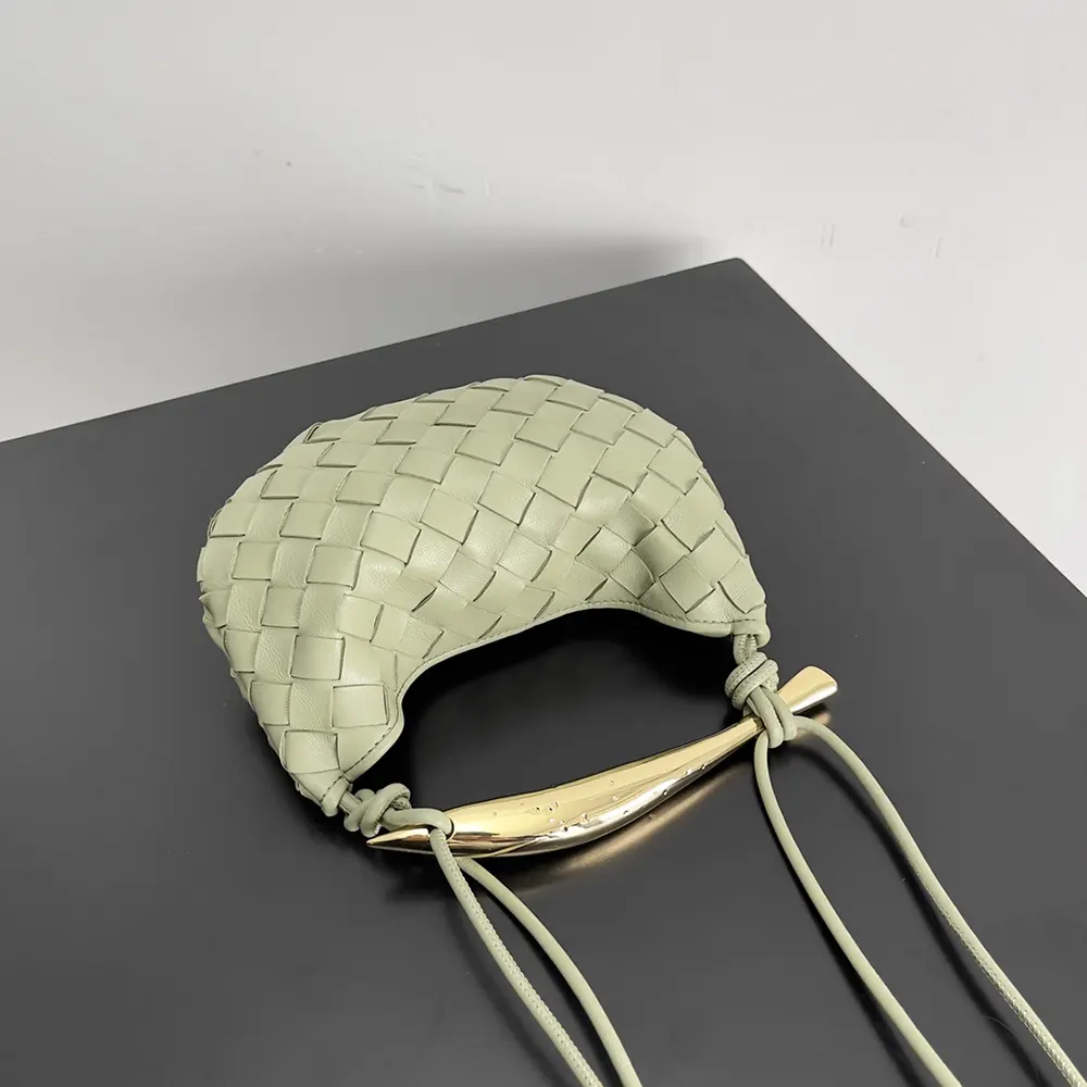 Side angle showing matte gold hardware on Bottega Veneta Women Baby Sardine-Green