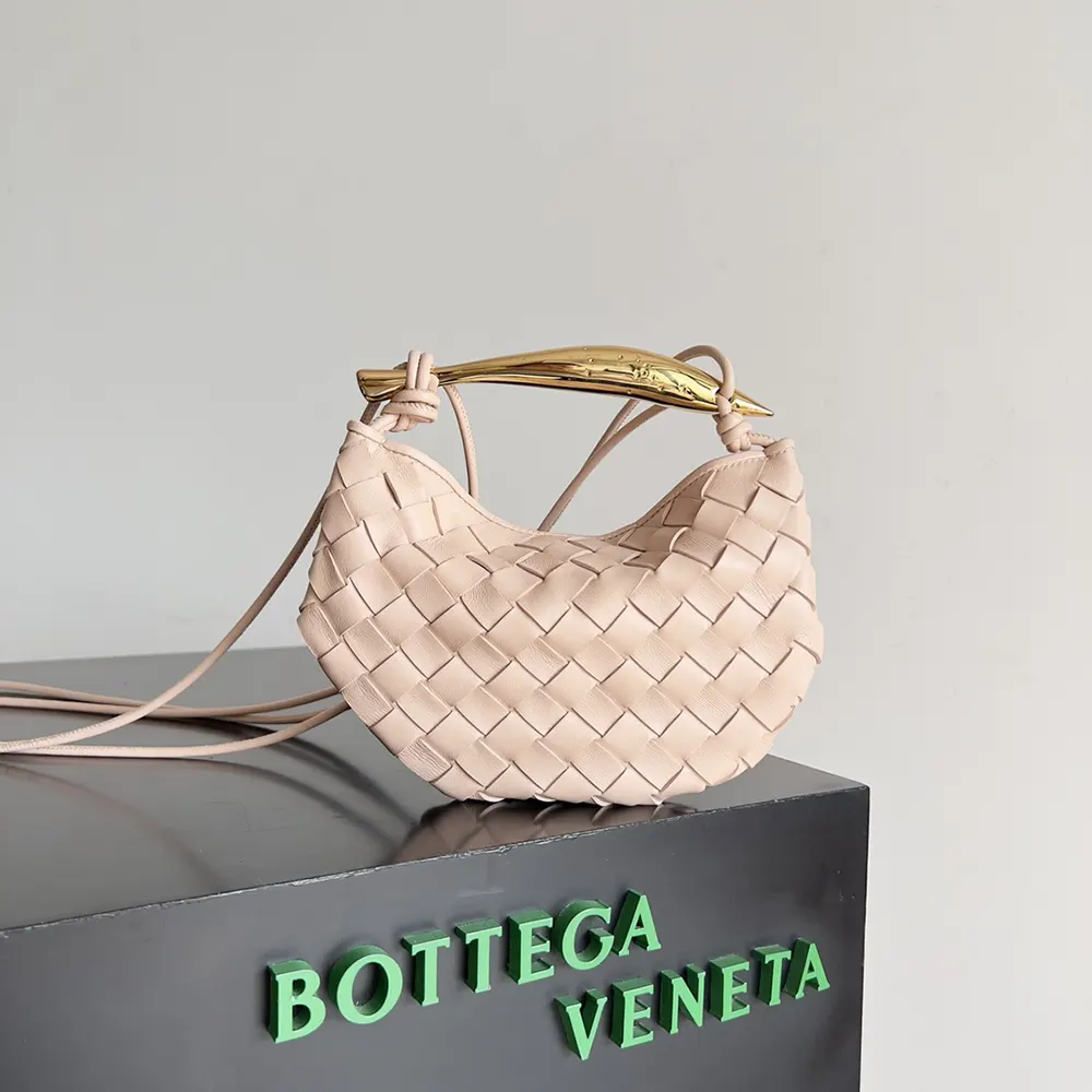 Close-up of intrecciato leather detail on Baby Sardine-Pink bag