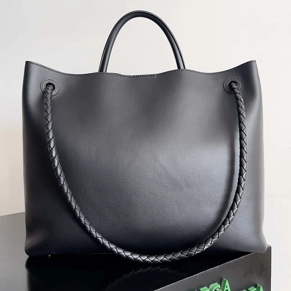 Side angle showcasing structured silhouette of Bottega Veneta Large Andiamo bag