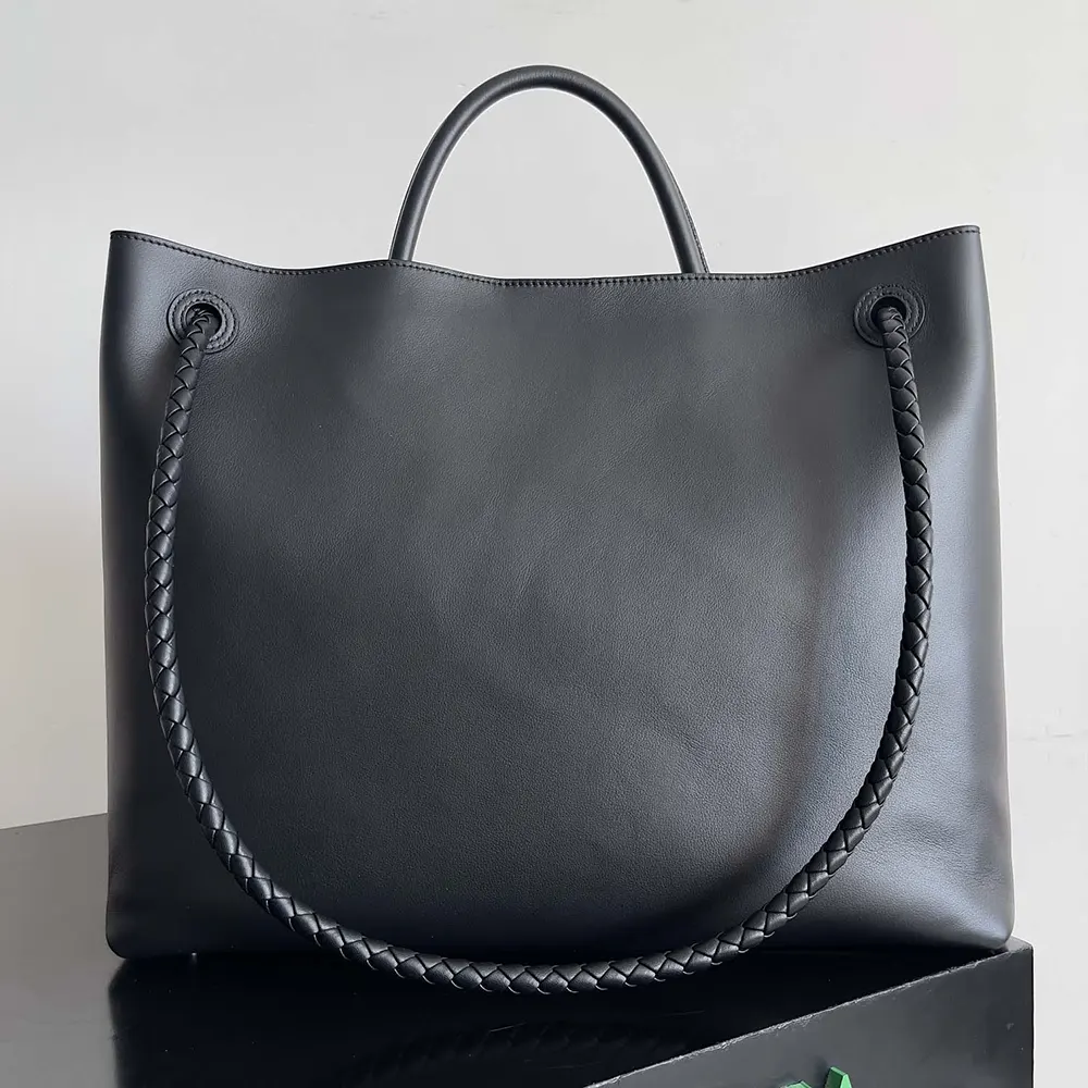 Side profile showing silhouette of Bottega Veneta Large Andiamo black bag