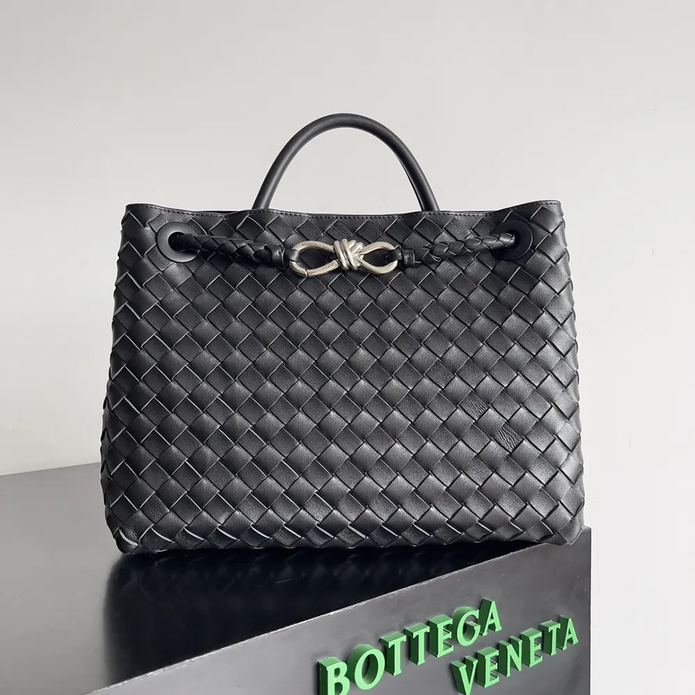 Close-up of silver hardware and woven leather on Bottega Veneta Medium Andiamo bag