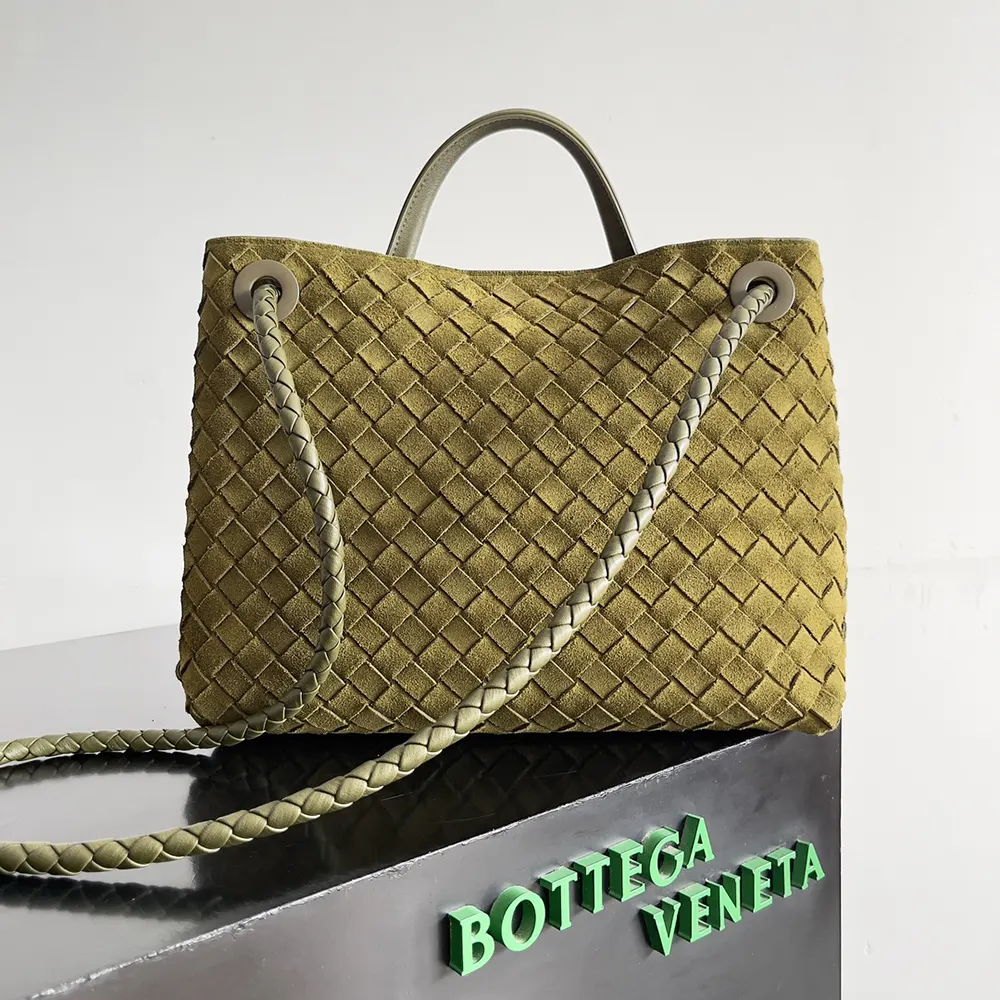 Side angle showing gold hardware and olive suede on Small Andiamo Top Handle Bag