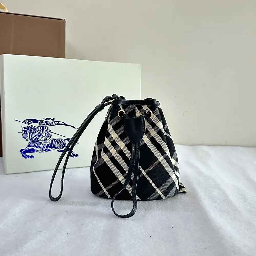 Close-up of drawstring closure and silver hardware on Burberry pouch