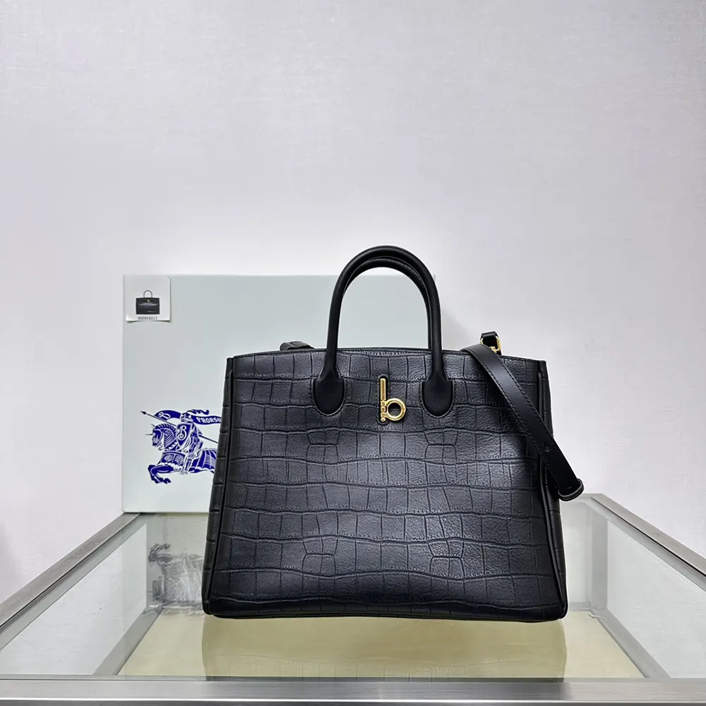 Close-up of silver Rocking Horse emblem on Burberry Women Medium Rocking Horse Tote