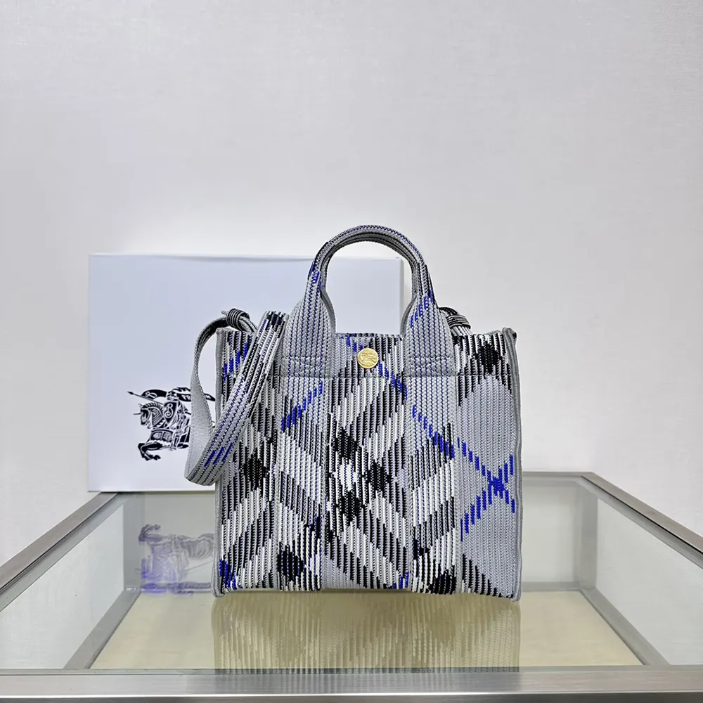 Close-up detail of Burberry signature check pattern on knitted tote