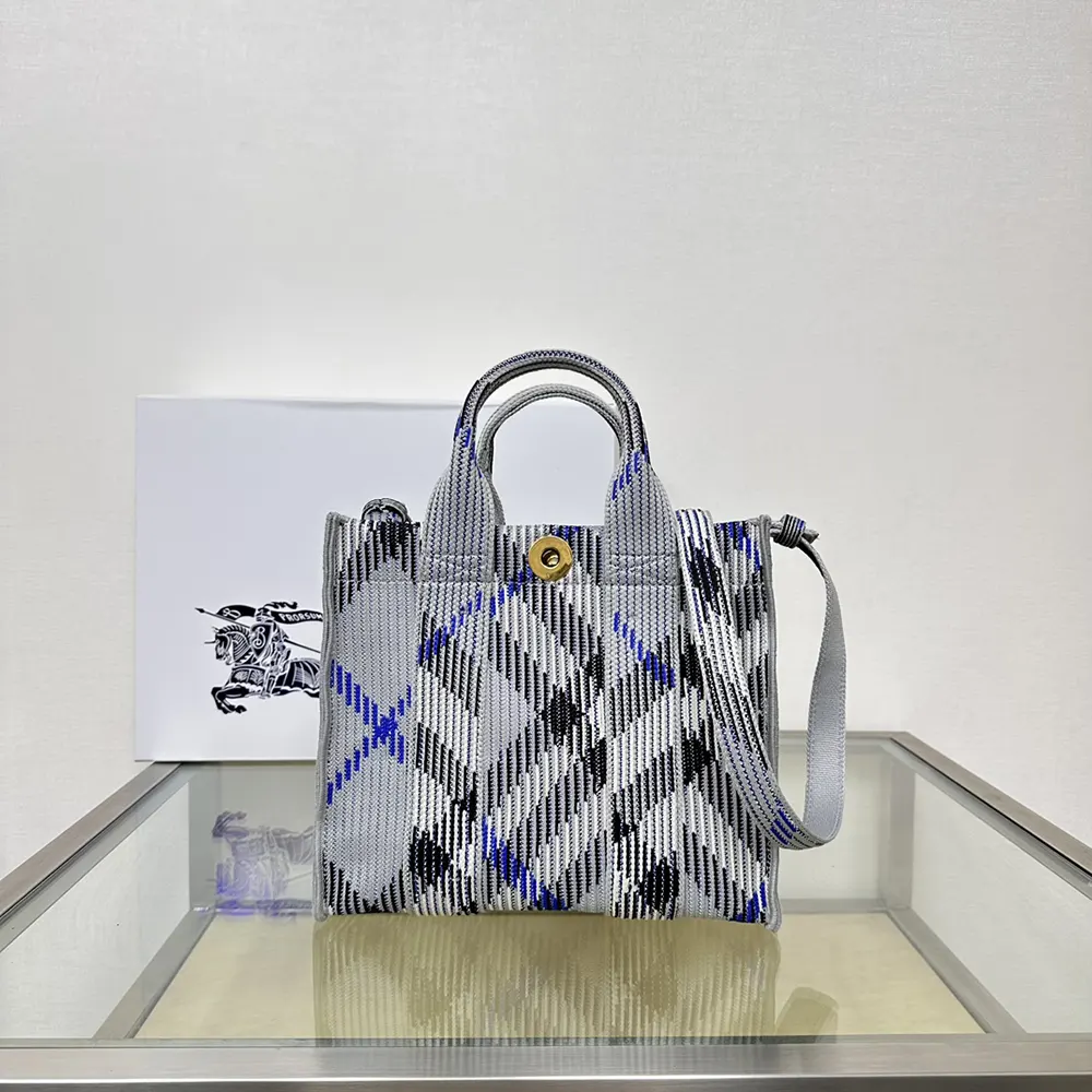 Side angle showcasing silver hardware on Burberry Women Mini Check Knitted Tote-Grey