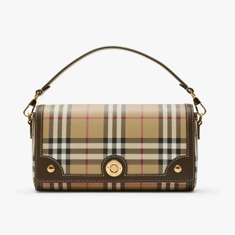 Front view of Burberry Women Top Handle Note Bag in brown leather
