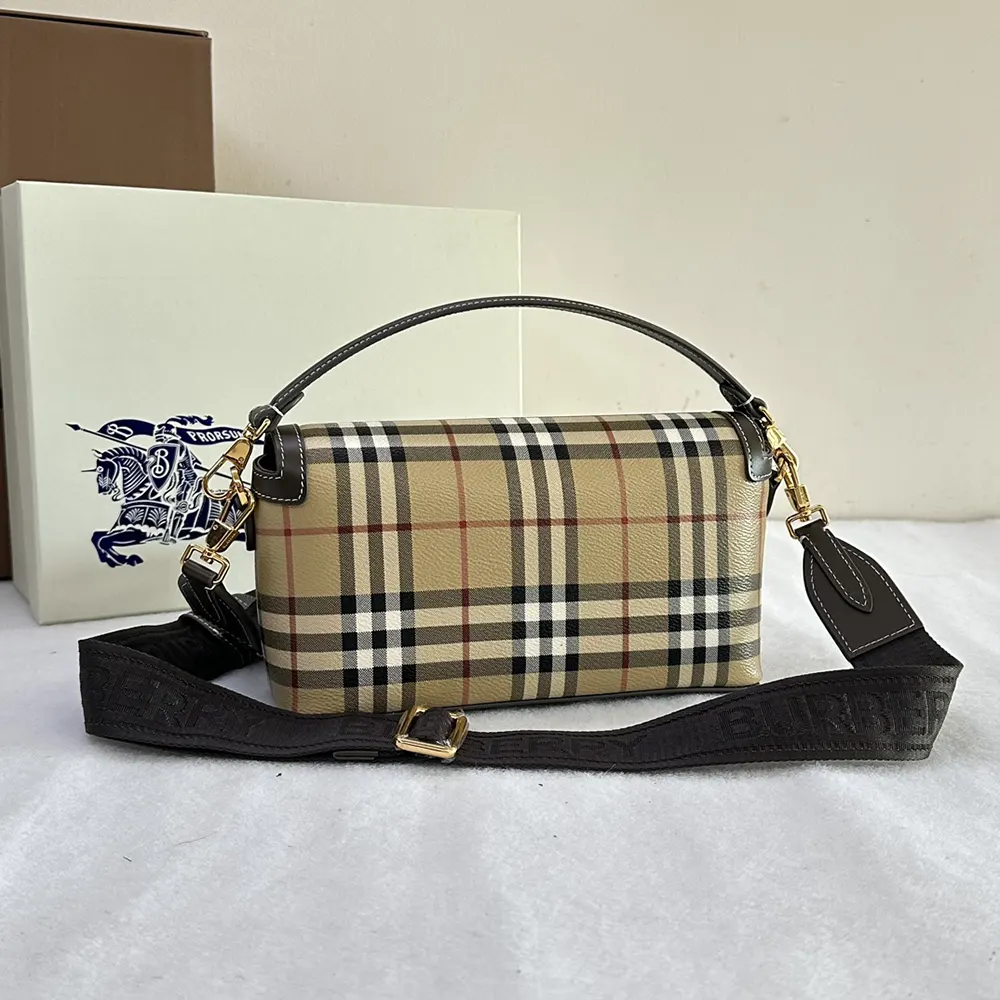 Side angle showing silhouette of Burberry Women Top Handle Note Bag