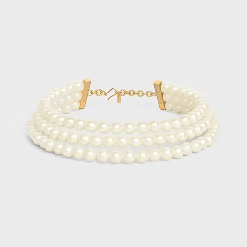 Close-up of Celine Women Les Perles Celine Necklace showing resin pearls