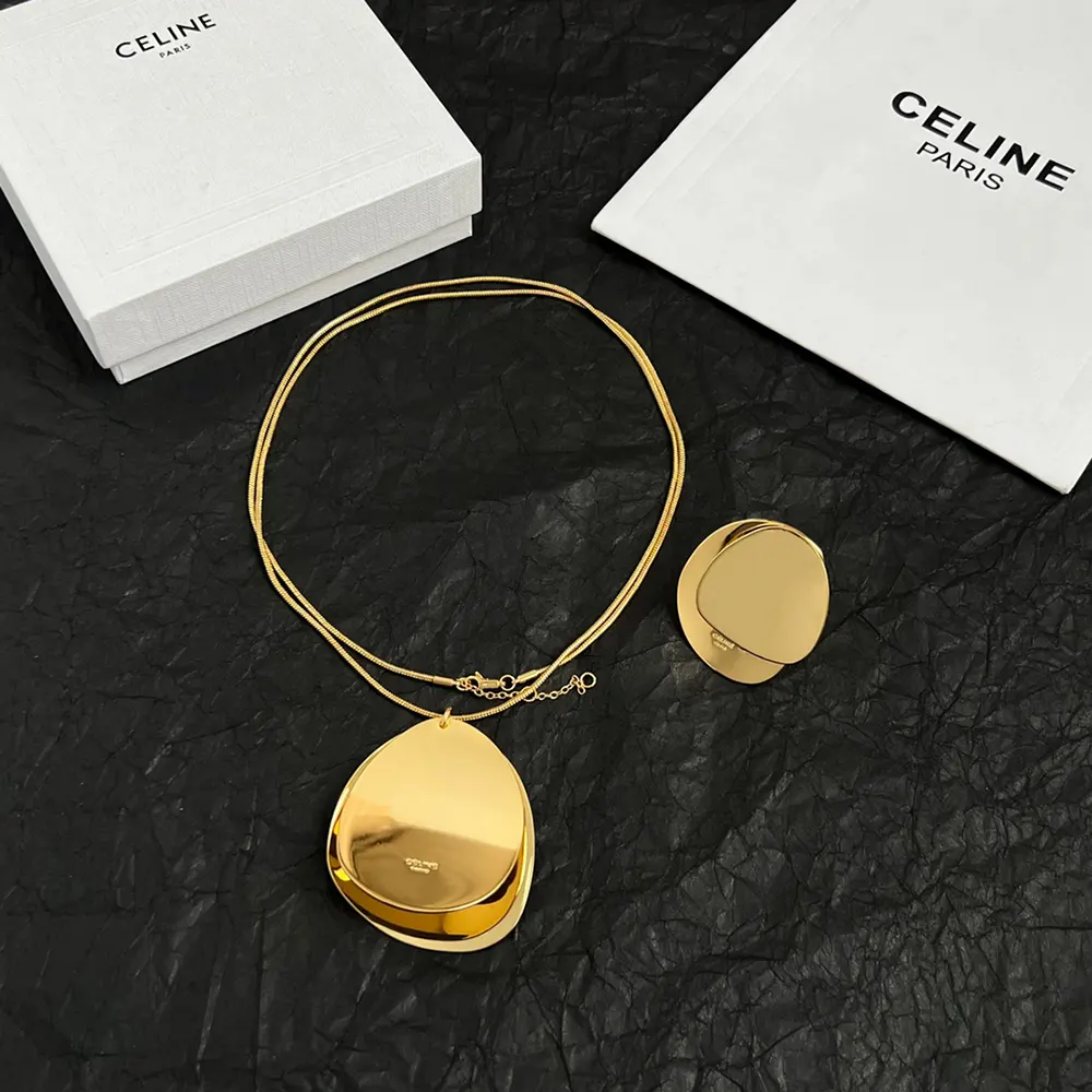 Celine Women Petale Necklace styled on model’s neck with gold shine