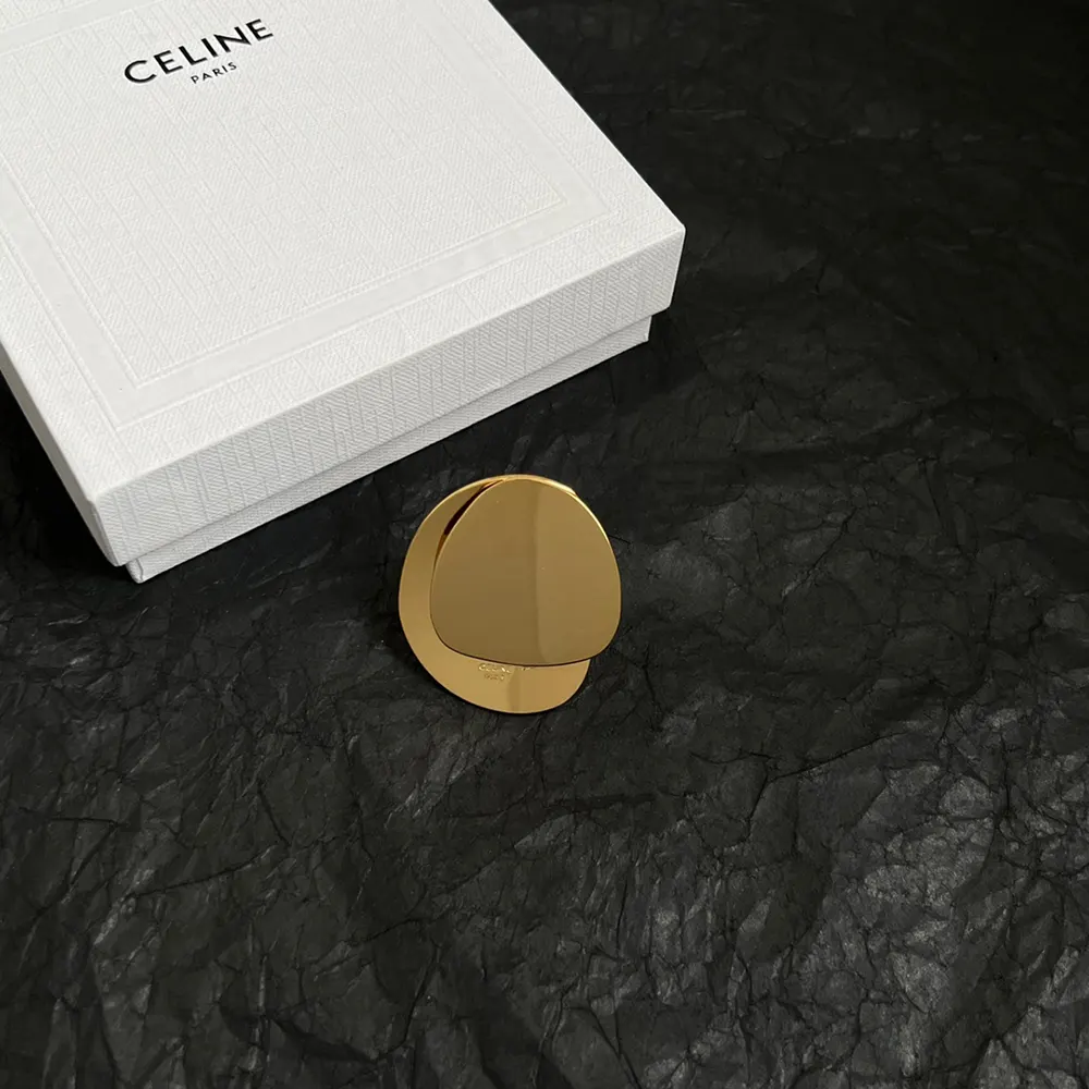 Side angle of Celine Women Petale Ring in Brass with Gold Finish highlighting band curve