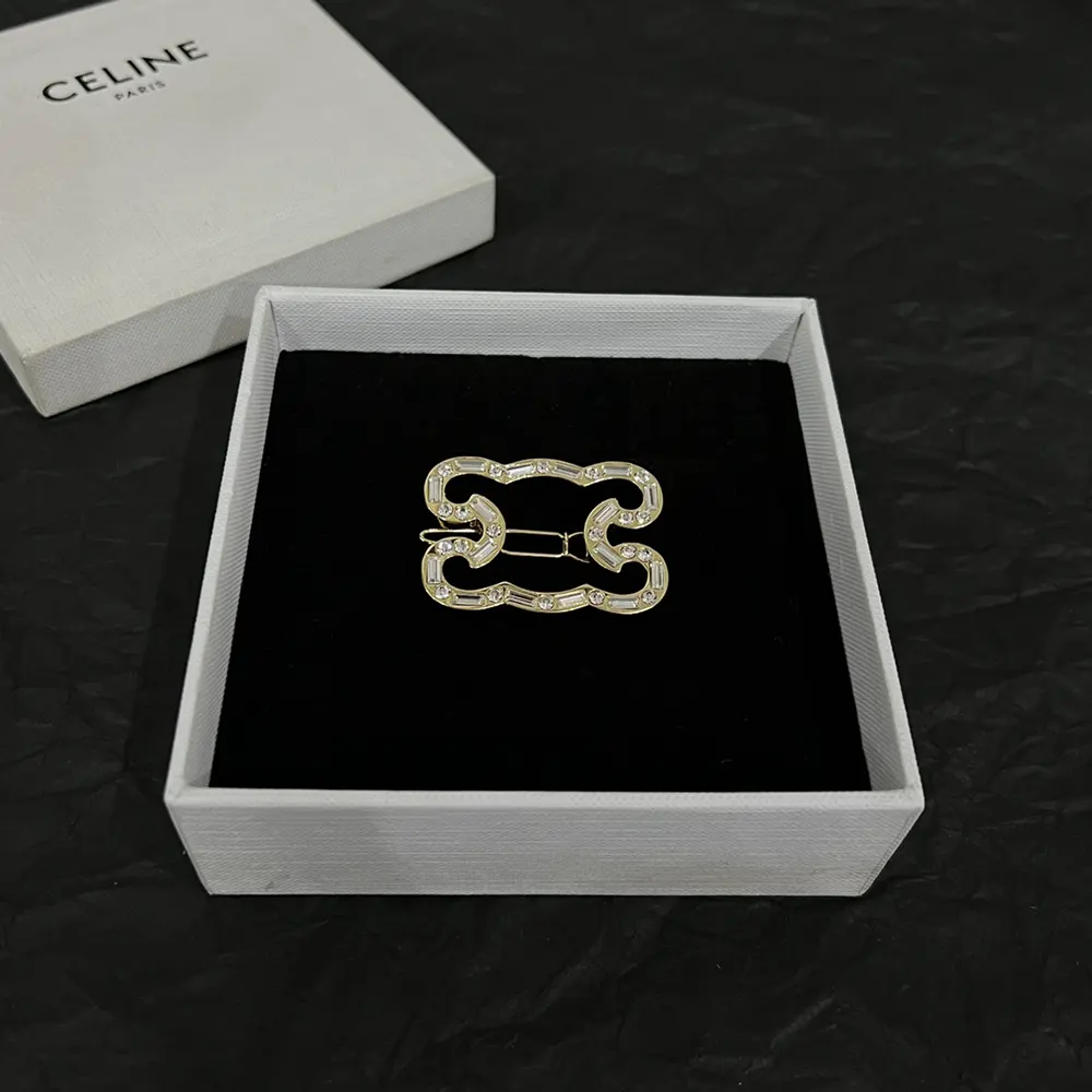 Side angle of Celine Women Triomphe Frame Sparkle Brooch showing pin closure