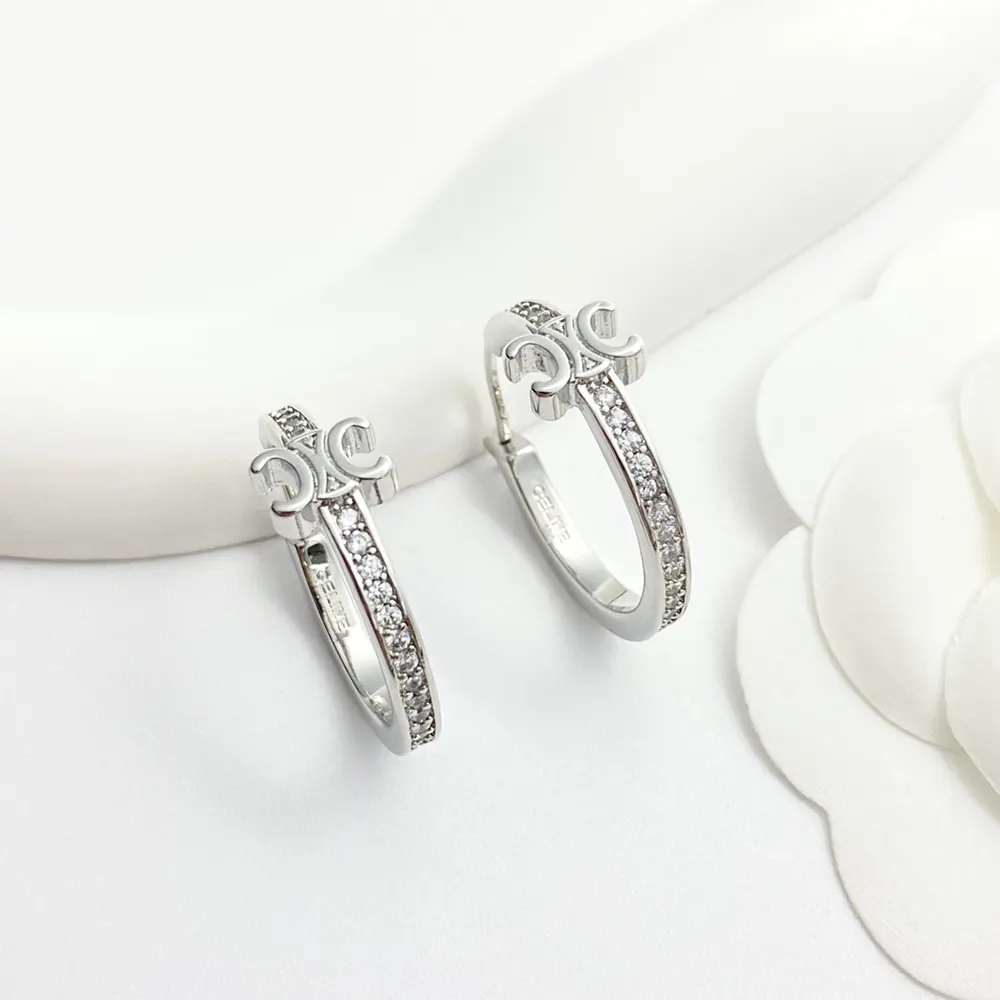 Close-up on strass crystal detail of Celine Women Triomphe Sparkle Hoops