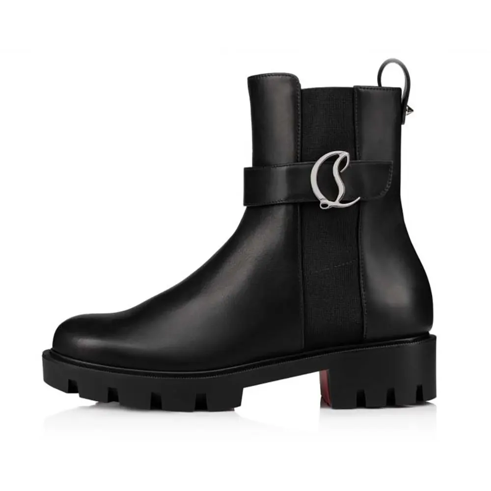 Side profile of Christian Louboutin CL Chelsea Booty Lug Low Boots black leather