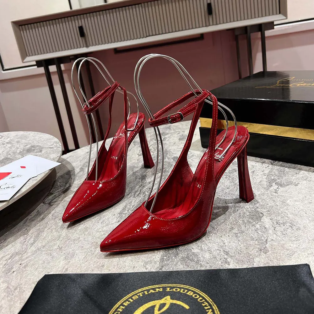 Detail of signature red lacquered sole on Christian Louboutin Women Condora Strap Pumps