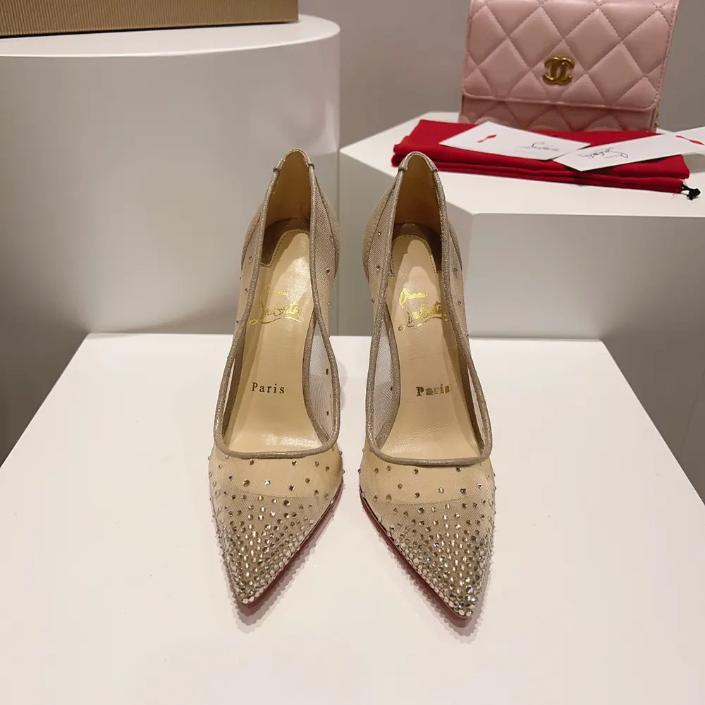 Close-up on strass crystal embellishments on Christian Louboutin Follies Pumps