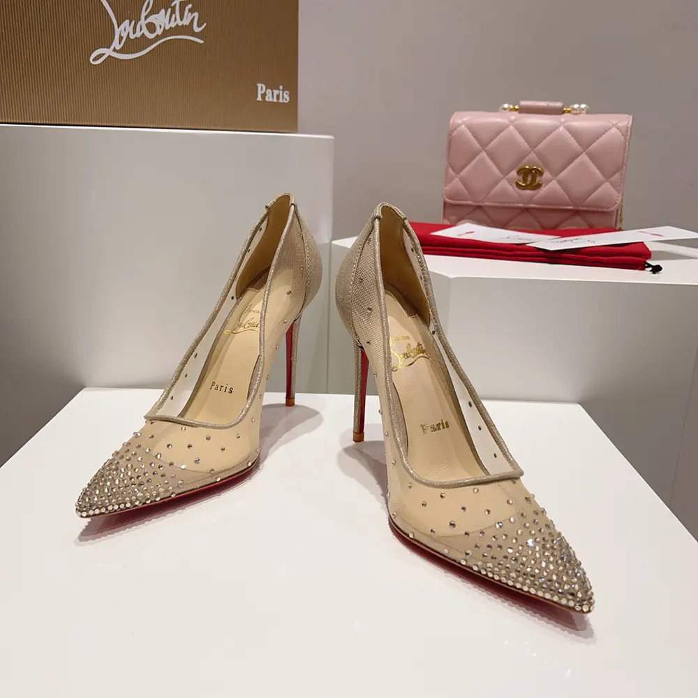 Top angle showing slip-on silhouette of Christian Louboutin Follies 100 mm Pumps