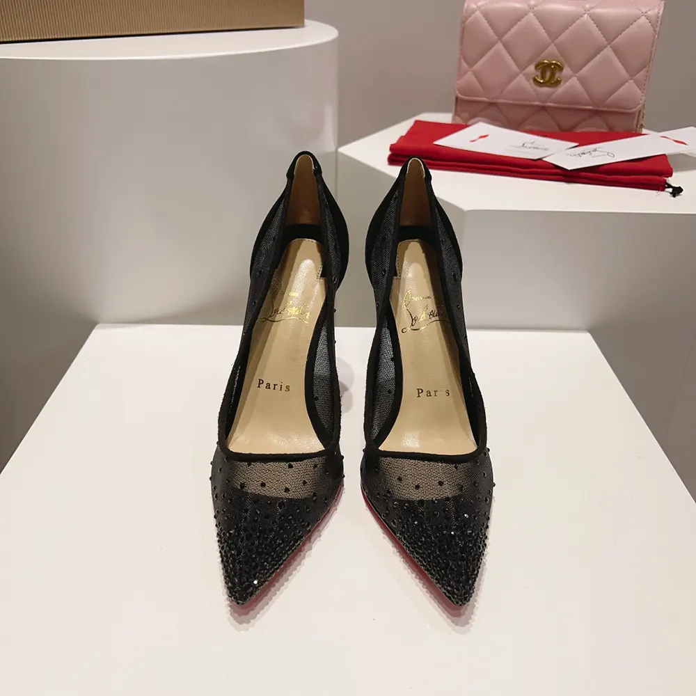Close-up of crystal strass detail on Christian Louboutin Women Follies Strass pumps